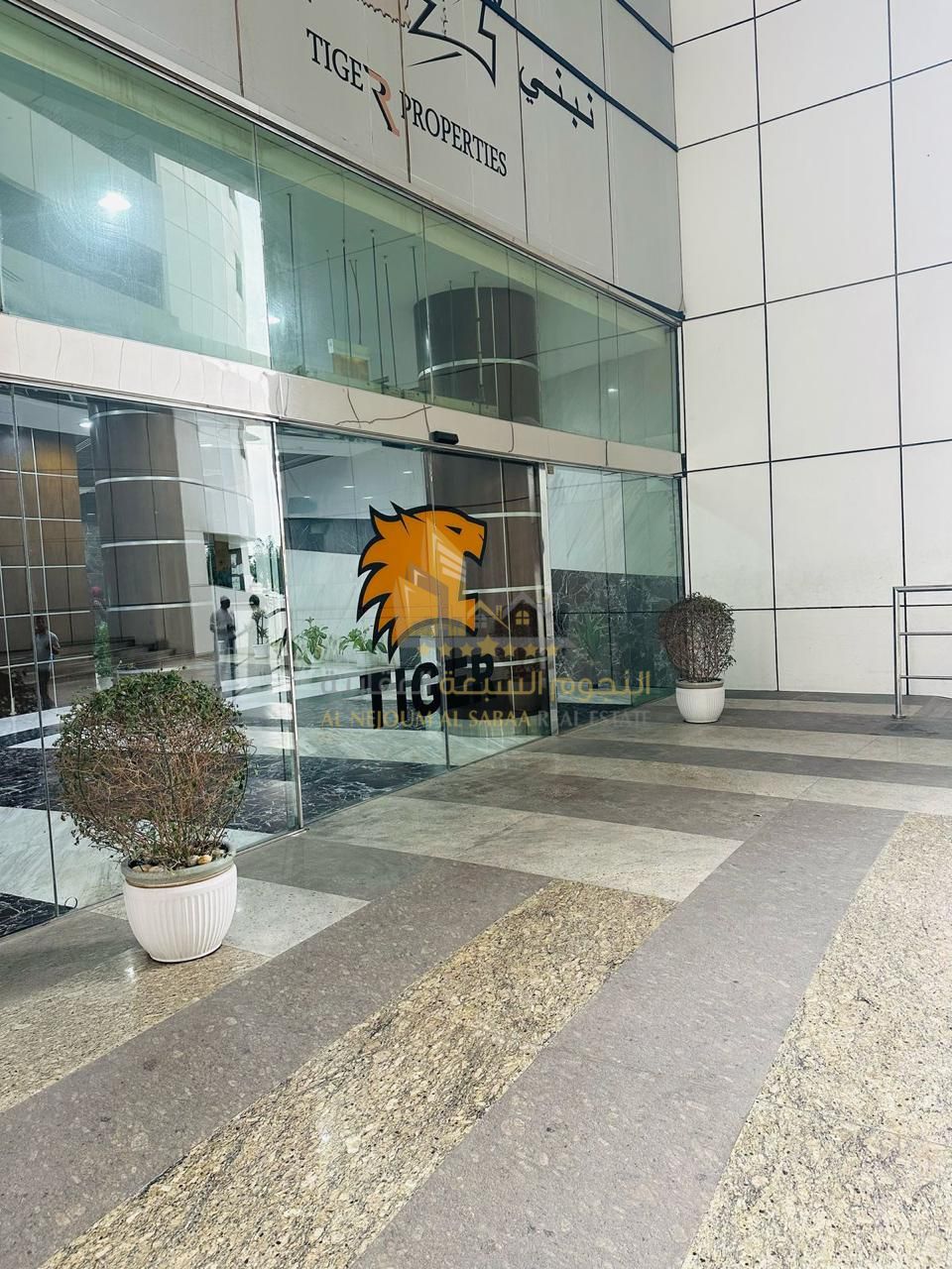 Apartment for sale in Al Taawun area overlooking the main street
