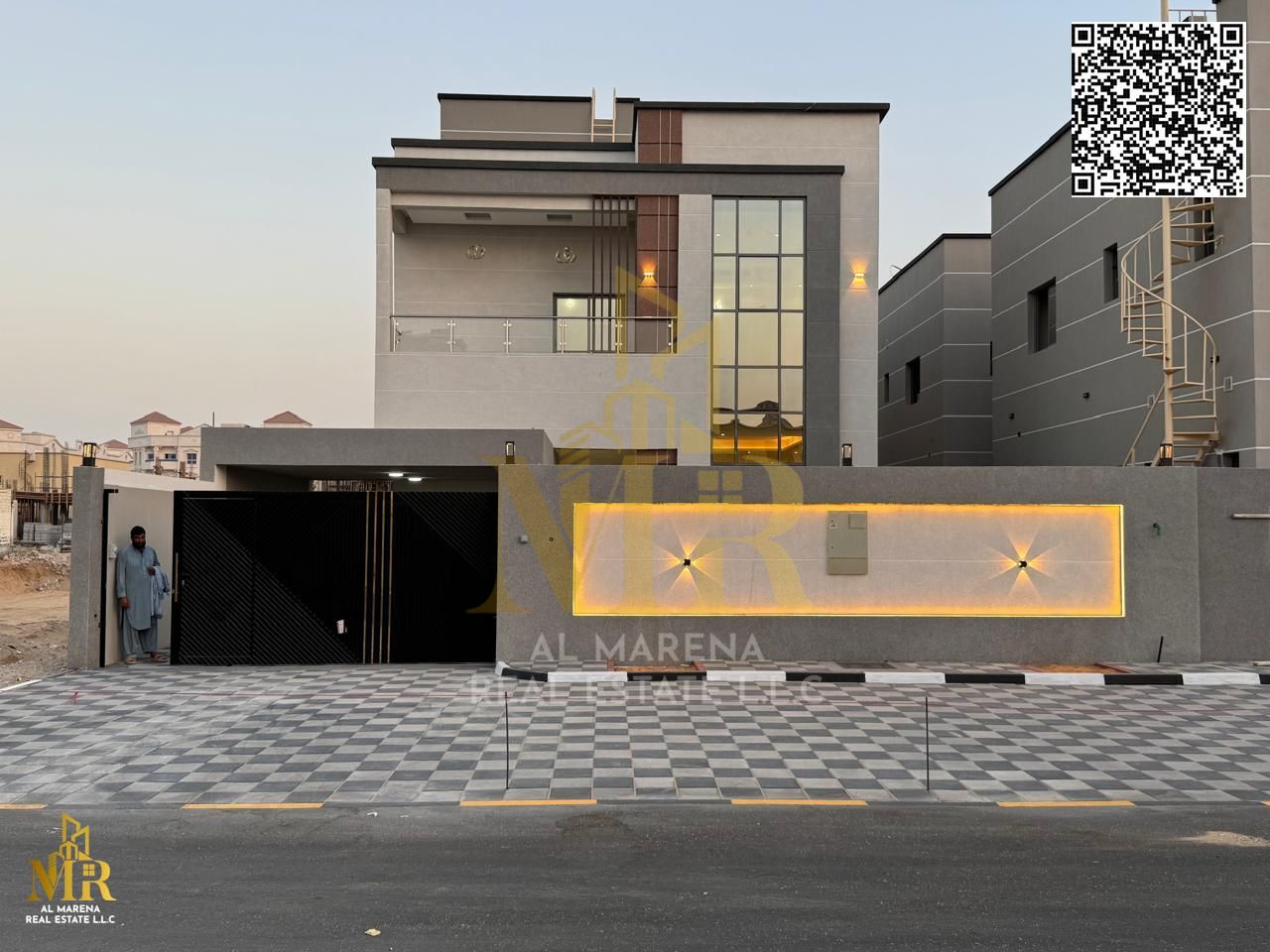 Luxury villa for sale in Al Rawda 2 - Ajman on Sheikh Ammar Street, area 4300 square feet, two floors + roof | 5 master bedrooms, a majlis and two hal