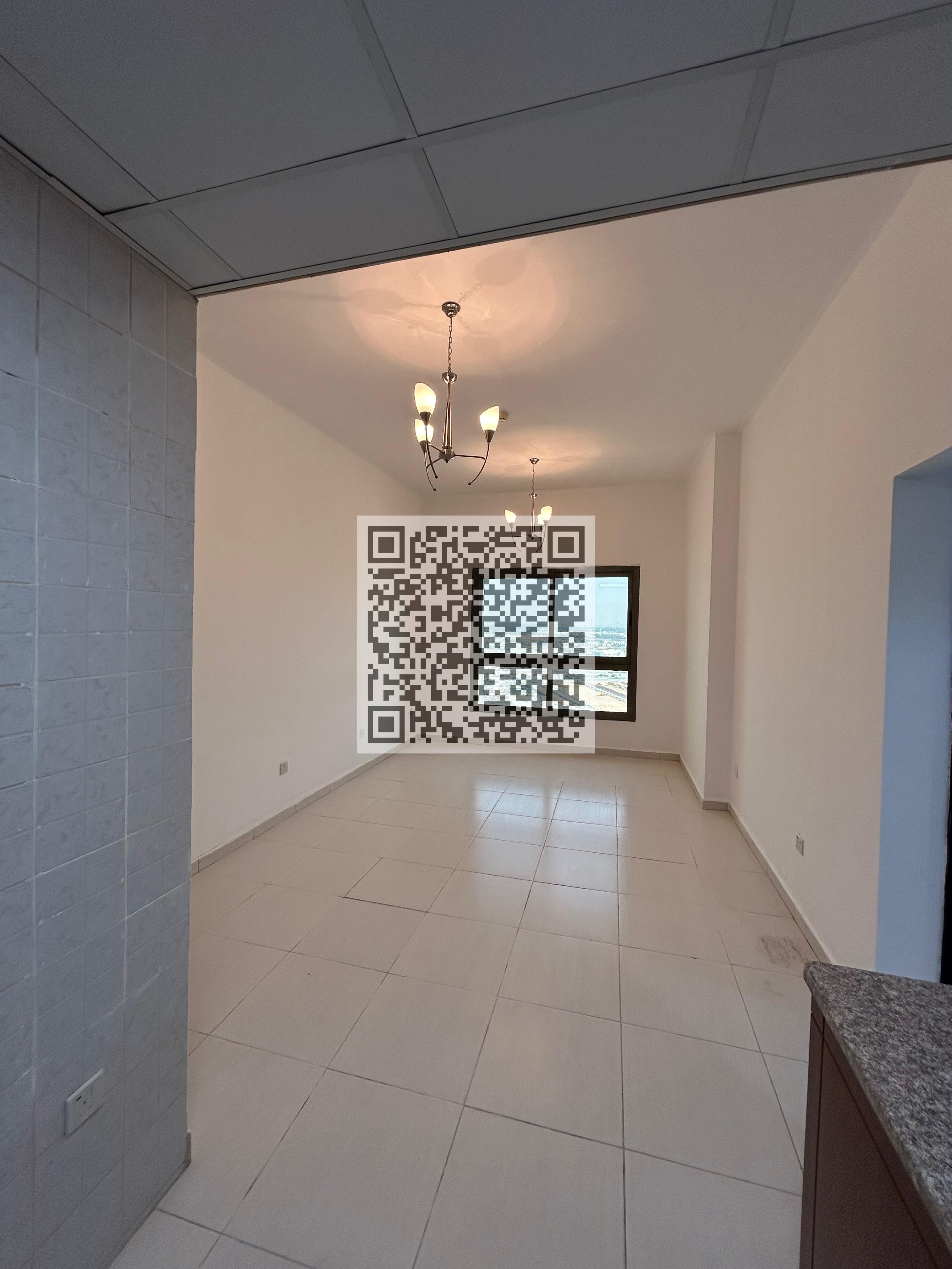 Spacious 3-Bedroom Apartment for Sale in Paradise Lake Towers B6, Emirates City, Ajman | Central AC & Open Views