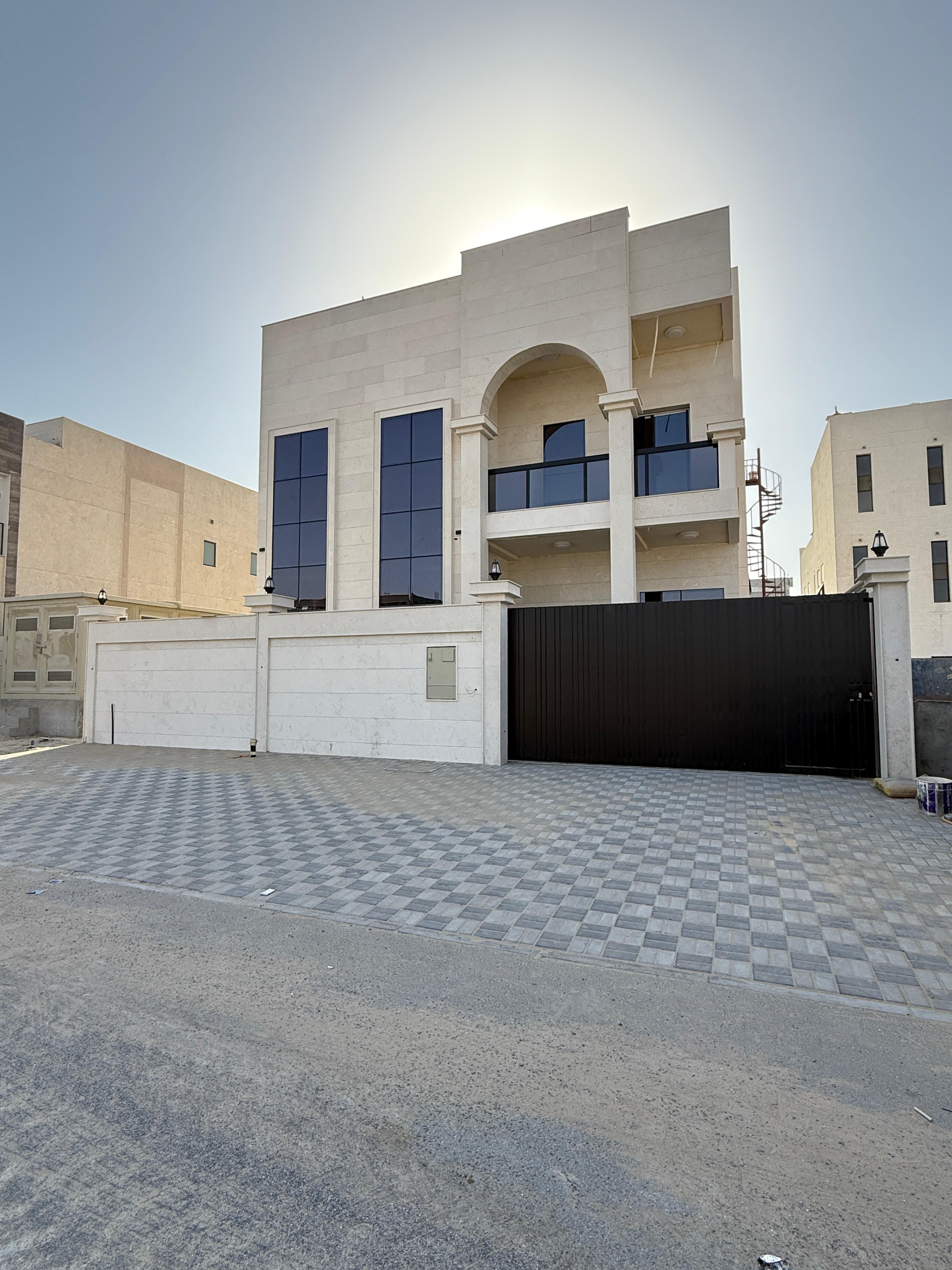 Villa for sale in Al Bahia, Ajman, 5 master bedrooms, a living room, and a separate maid's room