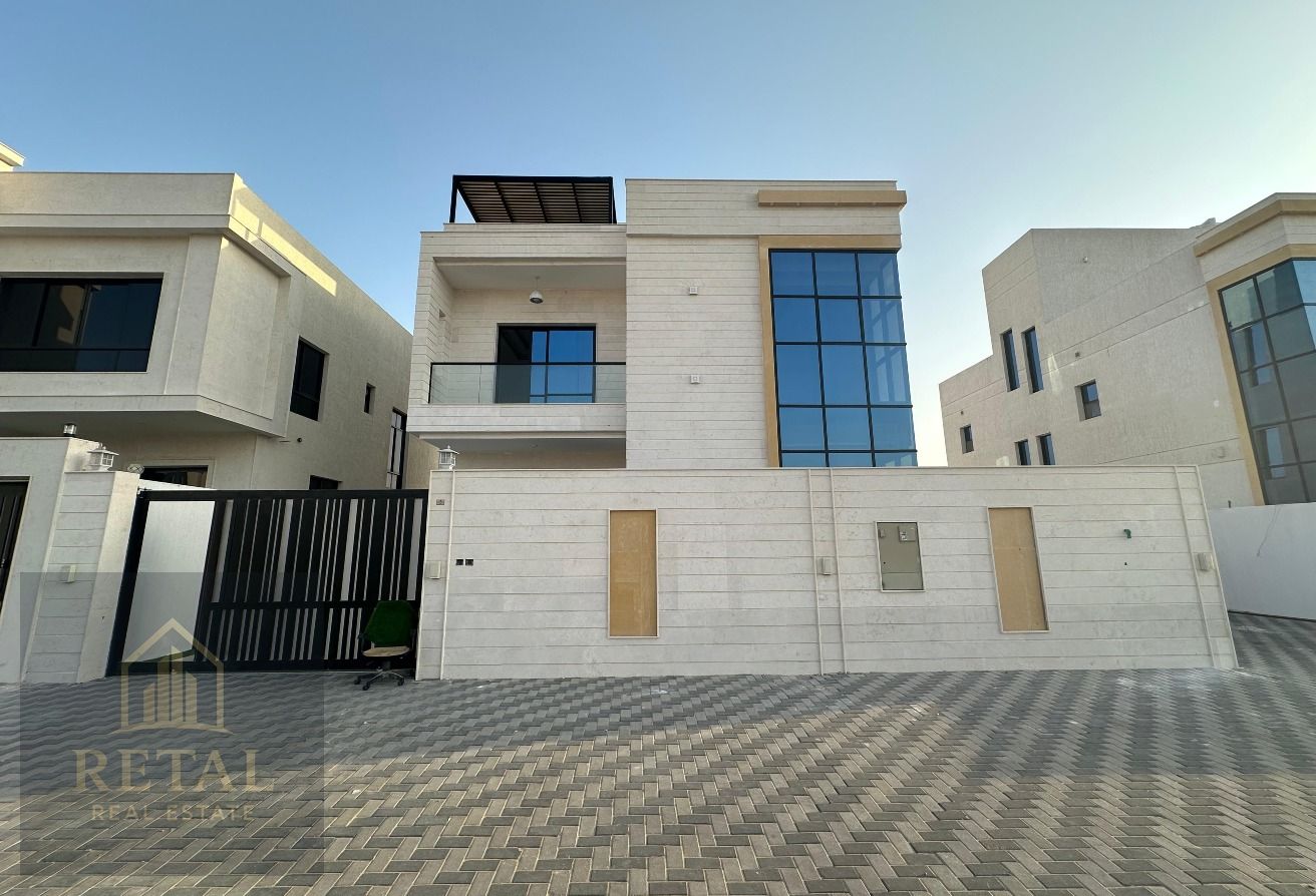 Modern spacious villa for sale in Al Amrah Ajman with large layout great location near services and schools freehold for all nationalities