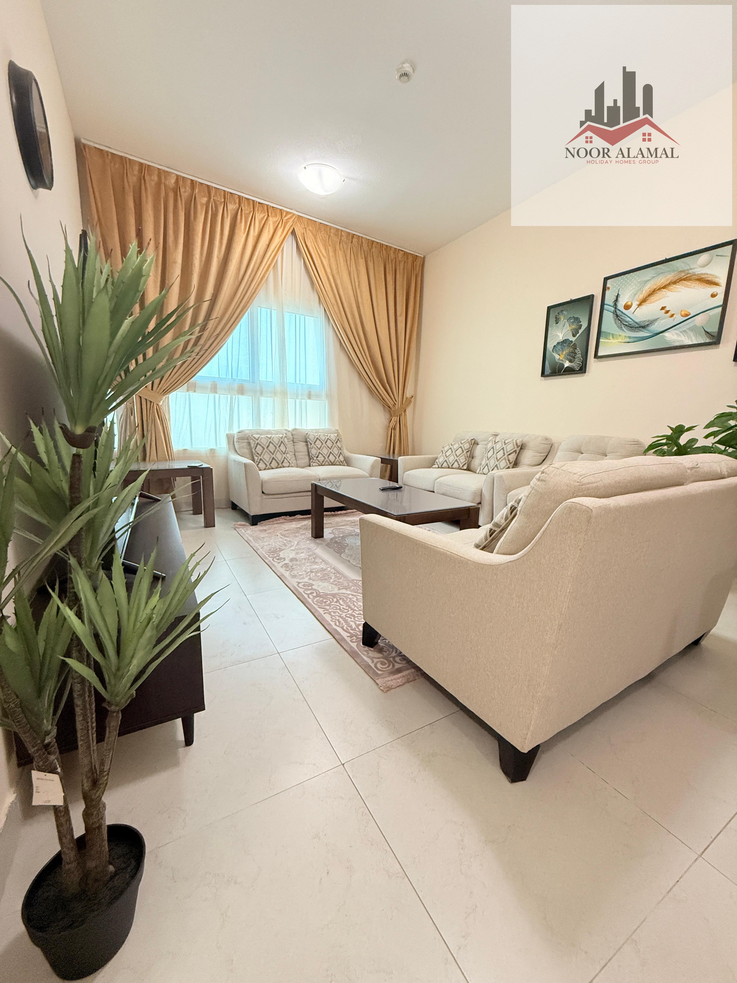 Sharjah - altaawun - Two bedroom apartment with a living room, kitchen, and two bathrooms