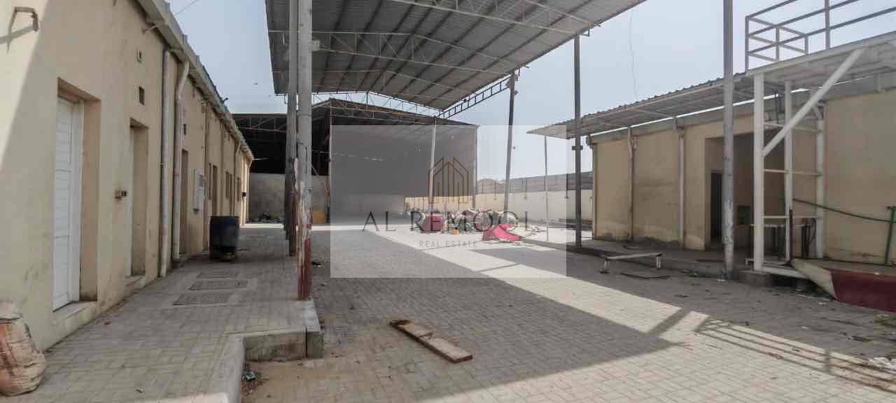 OPEN SHED WITH 8 LABOUR ROOM 2 OFFICE RENT 500K SIZE 20K SQFT IN SAJJA SHARJA