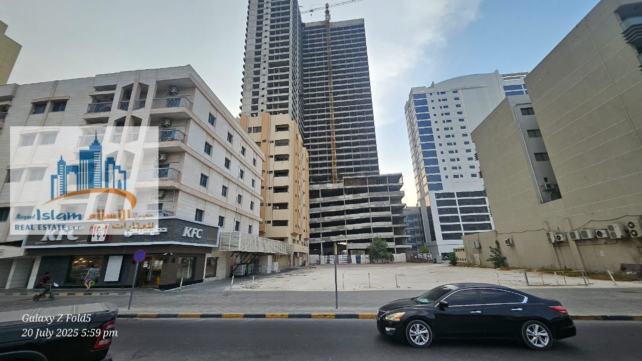 golden opportunity to buy land for building highly income. Prime location opposite Sharjah city center on the Highway road Commercial plot for sale.