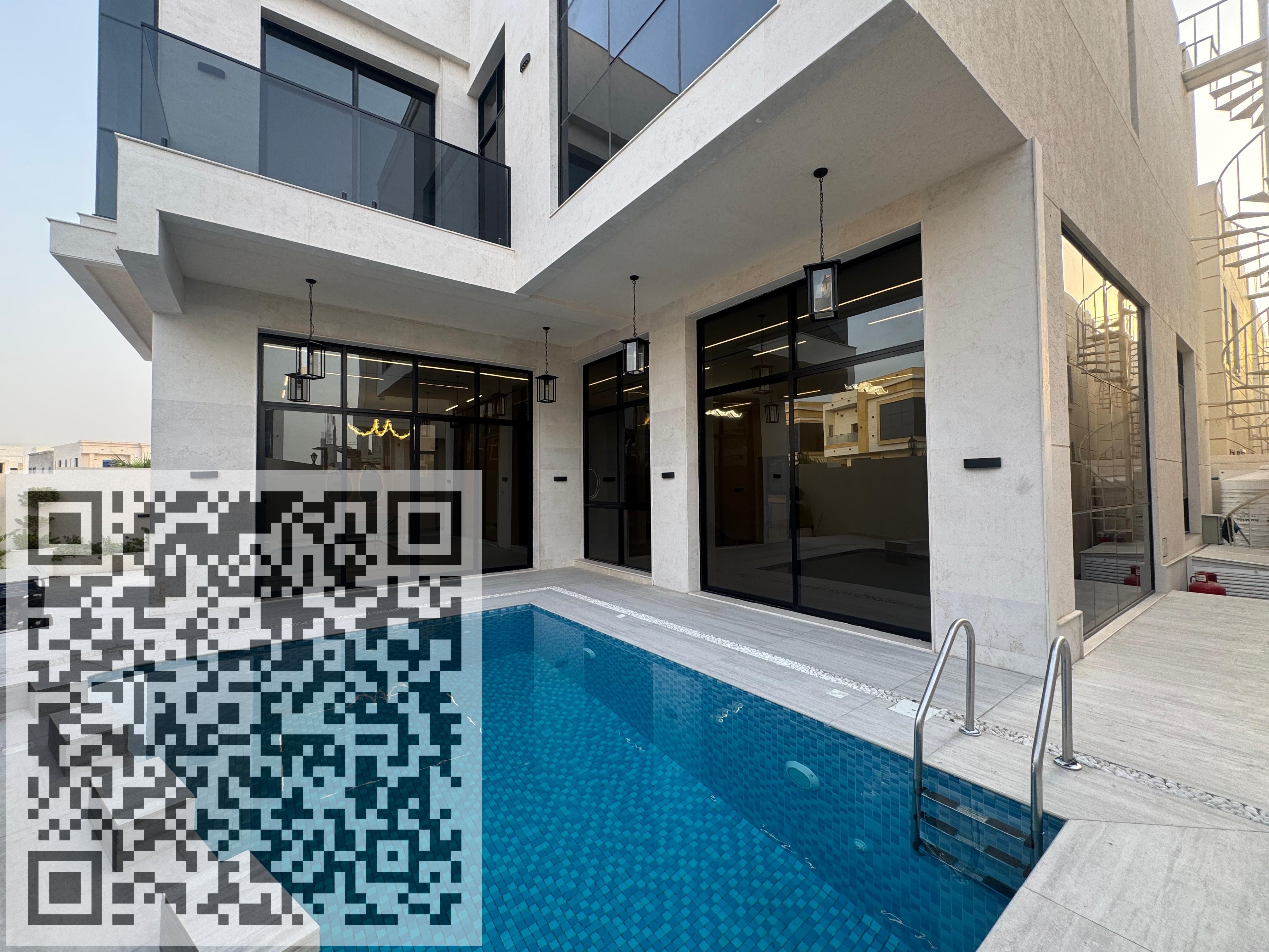 Corner 5 Bedrooms Villa With Electricity, Water, Swimming Pool,Central AC, Super Deluxe Finishing And A Natural Stone Façade in Al Yasmeen, Ajman.