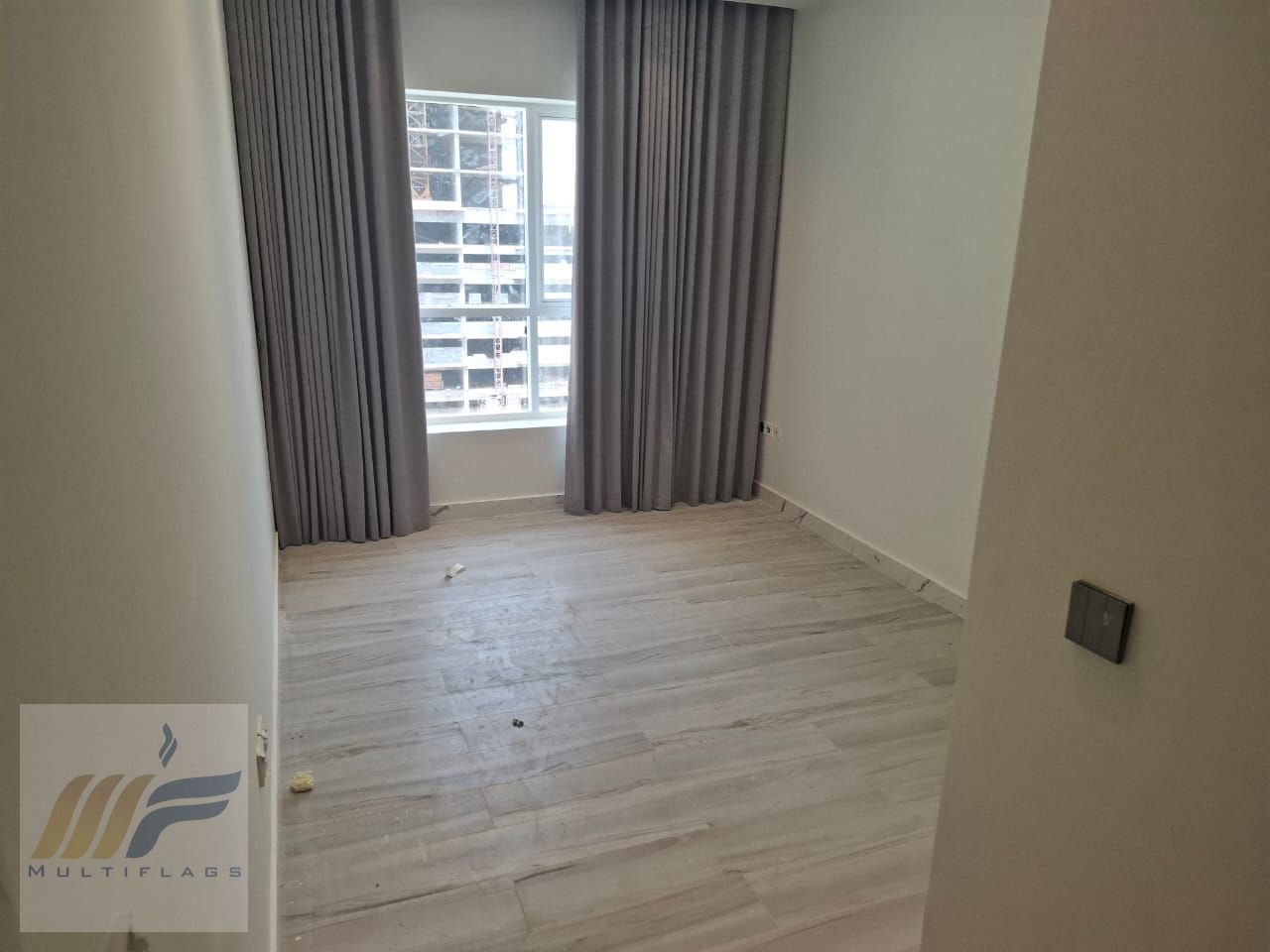Own a room and a hall in Gold Crescent Tower, Ajman, with a down payment of 65,000 dirhams