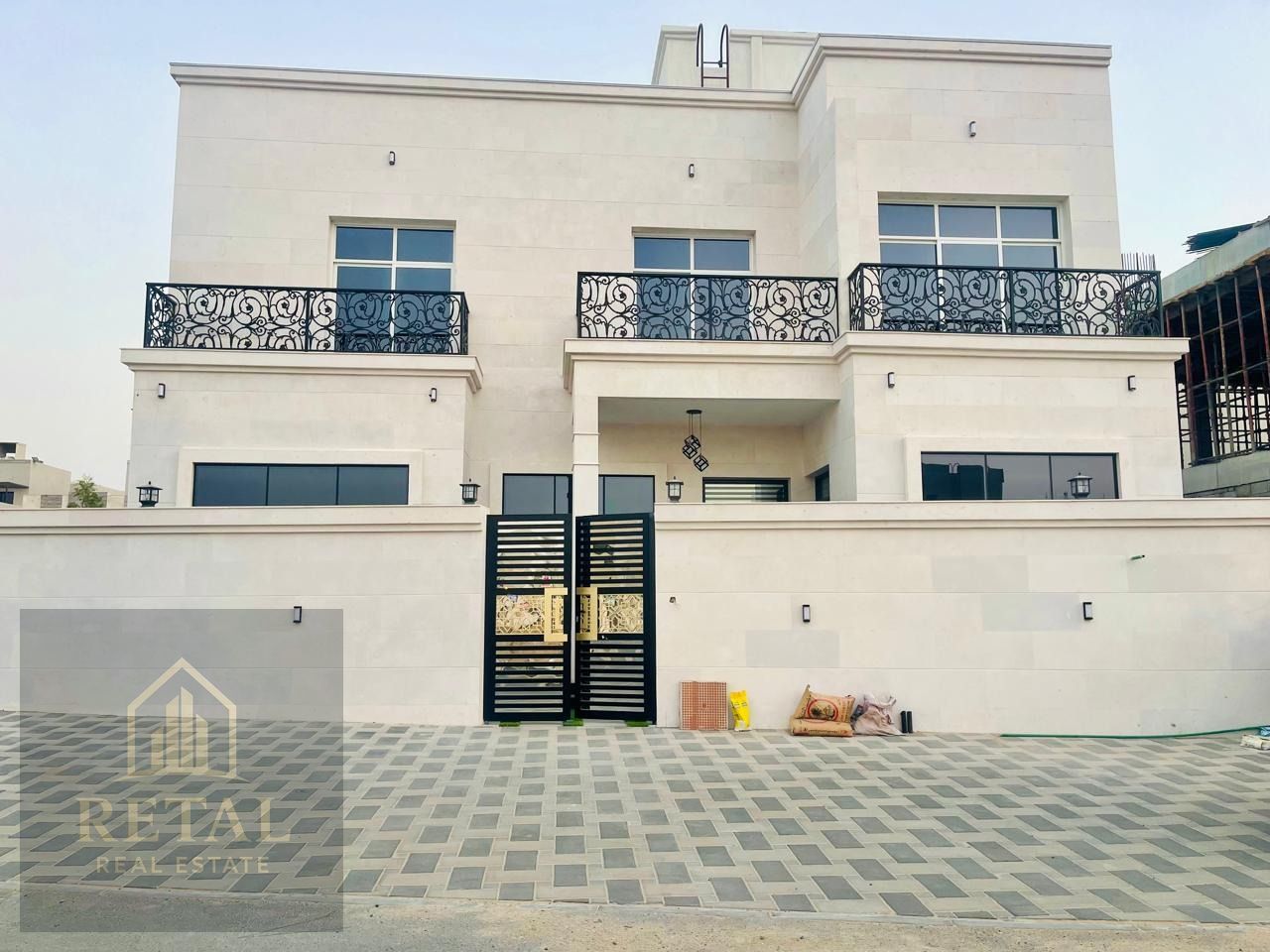 Luxury corner villa in Al Helio 2 Ajman with 3 floors 6 bedrooms private pool jacuzzi maid room modern design free registration ready to move
