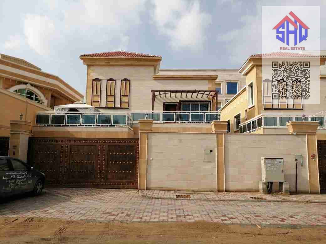 For sale, a villa in Al-Muwaihat, including electricity and air conditioning, close to all services, 6 rooms, a sitting room, a hall, and a maid's room with a dressing room