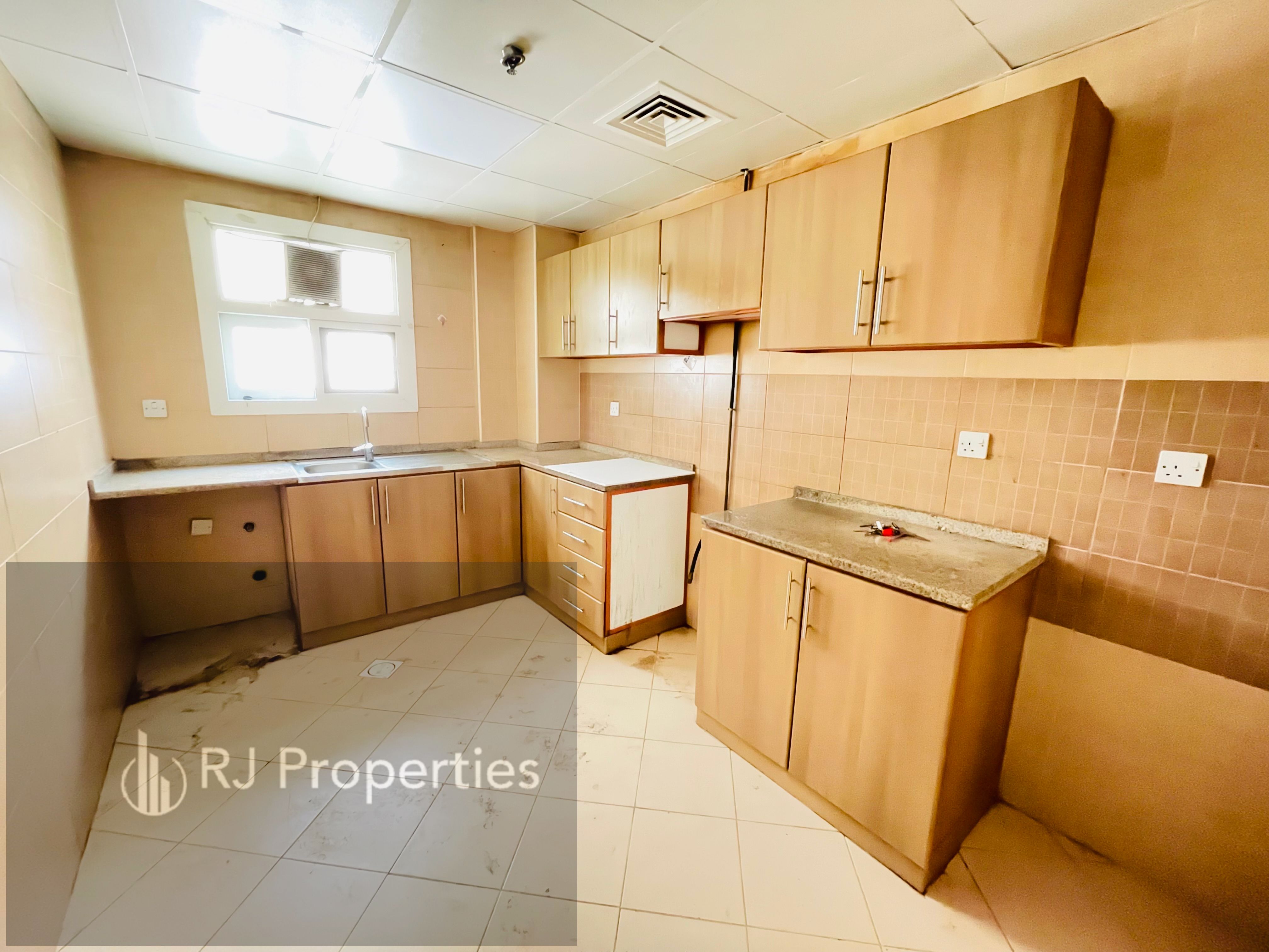 Spacious 2 bhk apartment - balcony and wardrobes - easy exit for dubai and ajman
