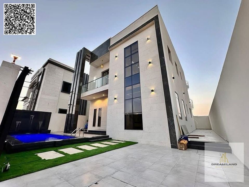 For sale - a luxury villa with a swimming pool in a prime location in Ajman, high-end finishing, modern design, including registration and owners