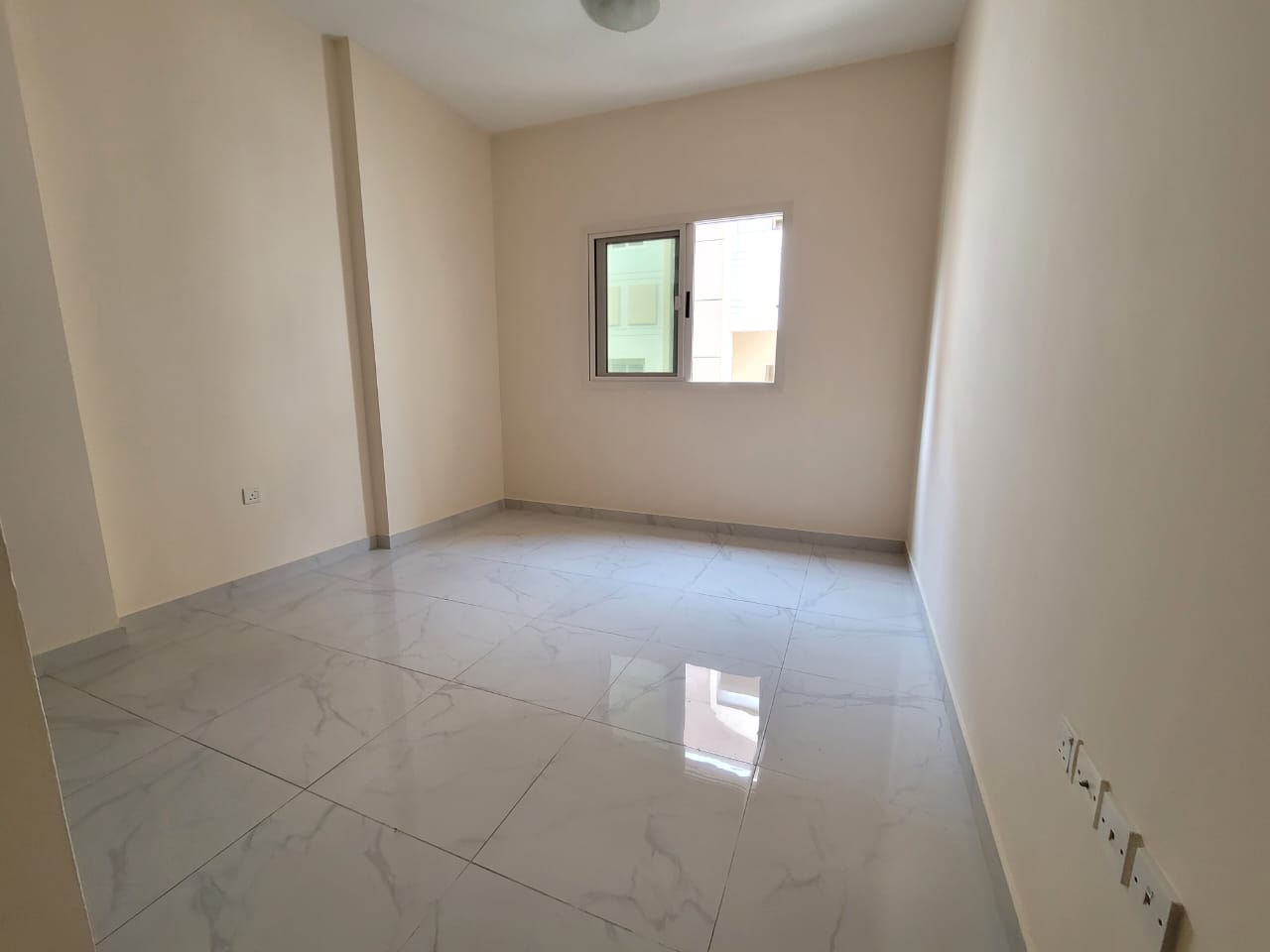Big one studio apartment with cover parking separate kitchen close to al zahia city center