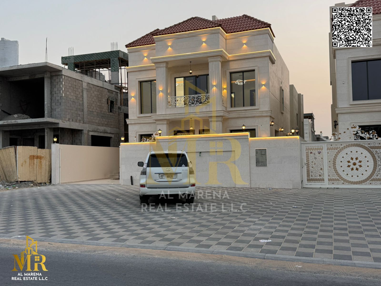 A villa with a price including registration and ownership fees on the main street, ready for occupancy in the most upscale areas of Ajman, freehold fo