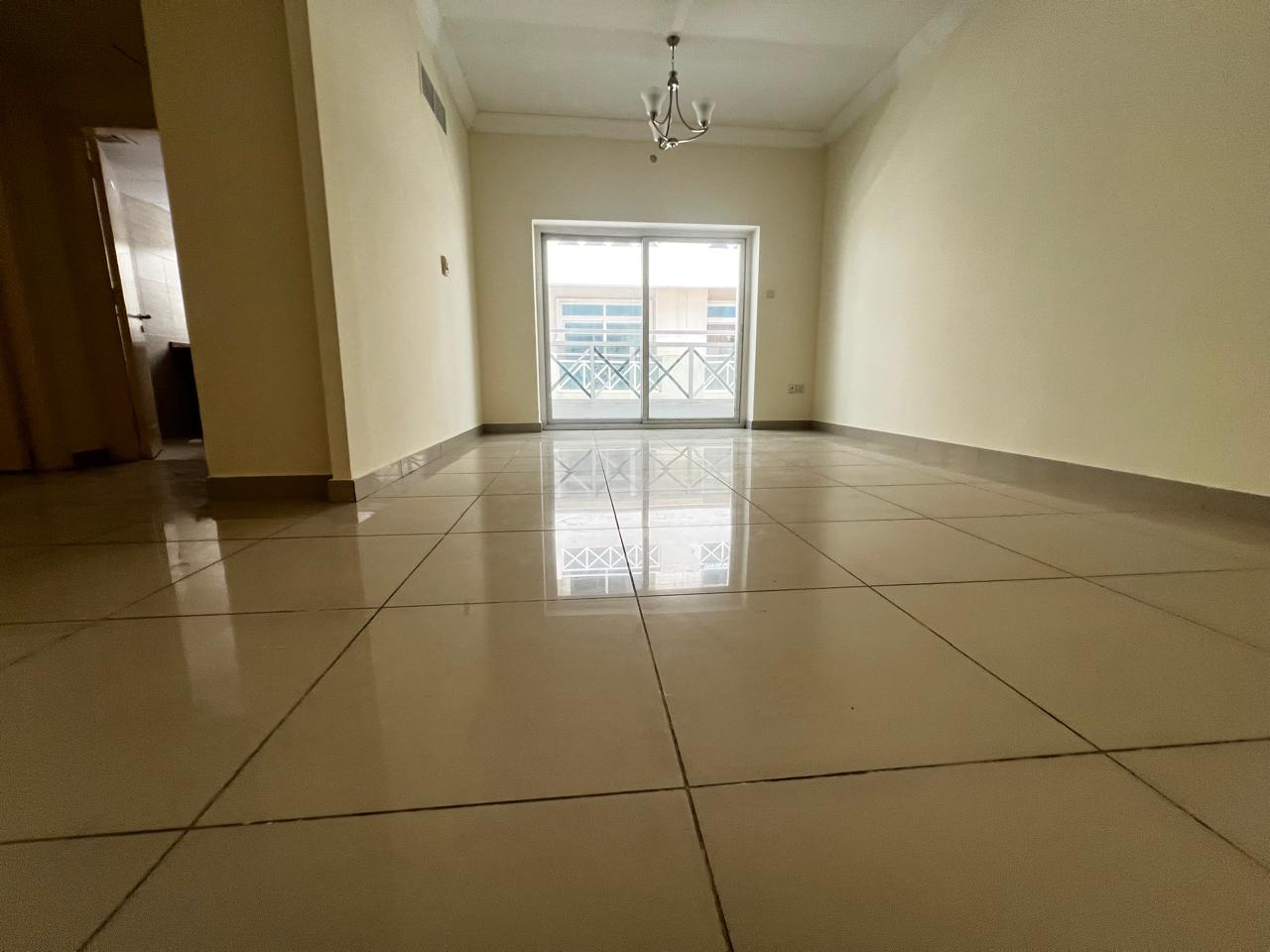 Like brand new building Muwaileh Commercial sharja 1bhk with balcony 2 washroom with master room with waldrop parking