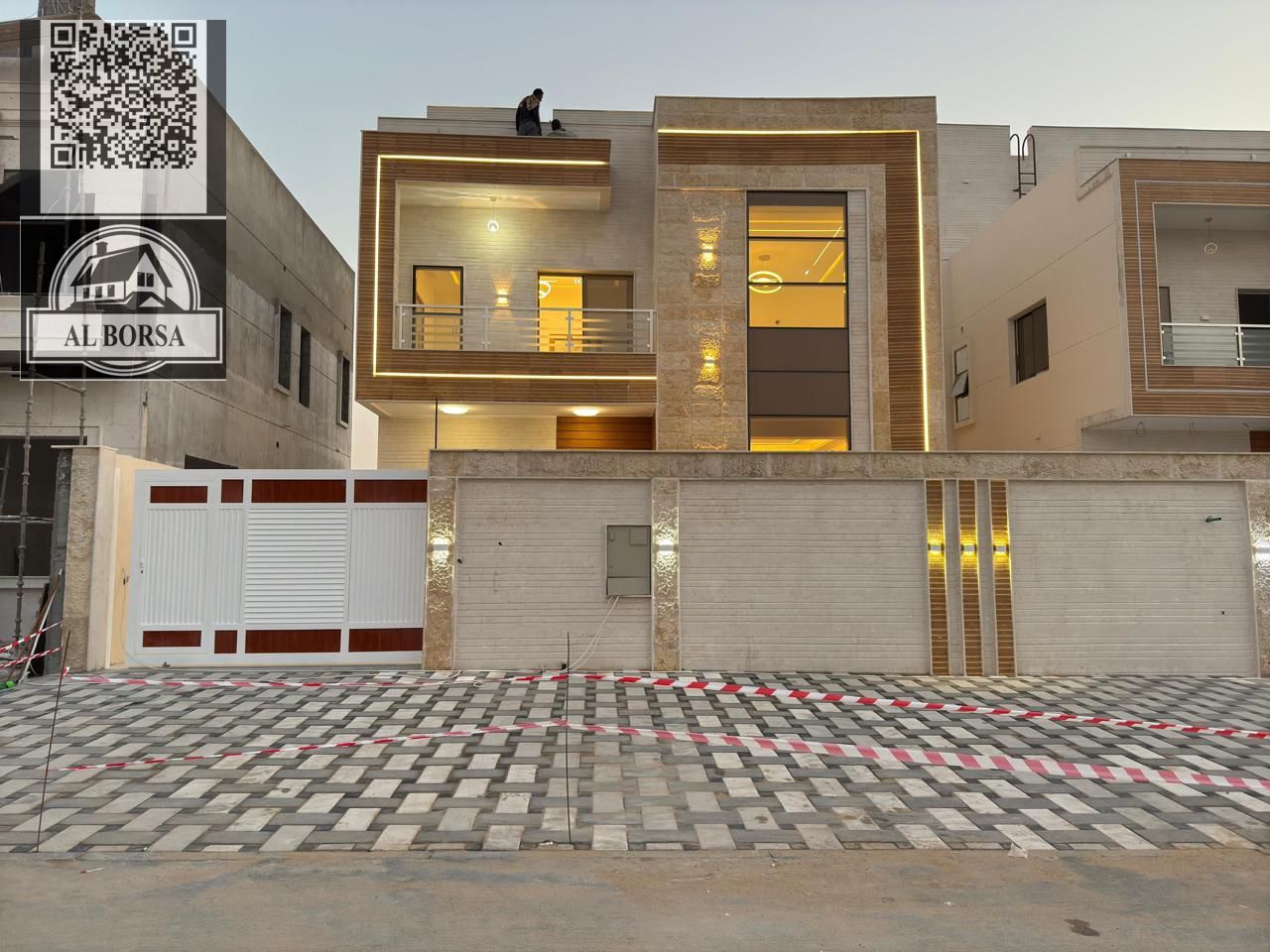Villa for rent, first inhabitant in Al Helio 2, Ajman, 4 master bedrooms, maid’s room, two halls, a sitting room and a roof, next to all services on t