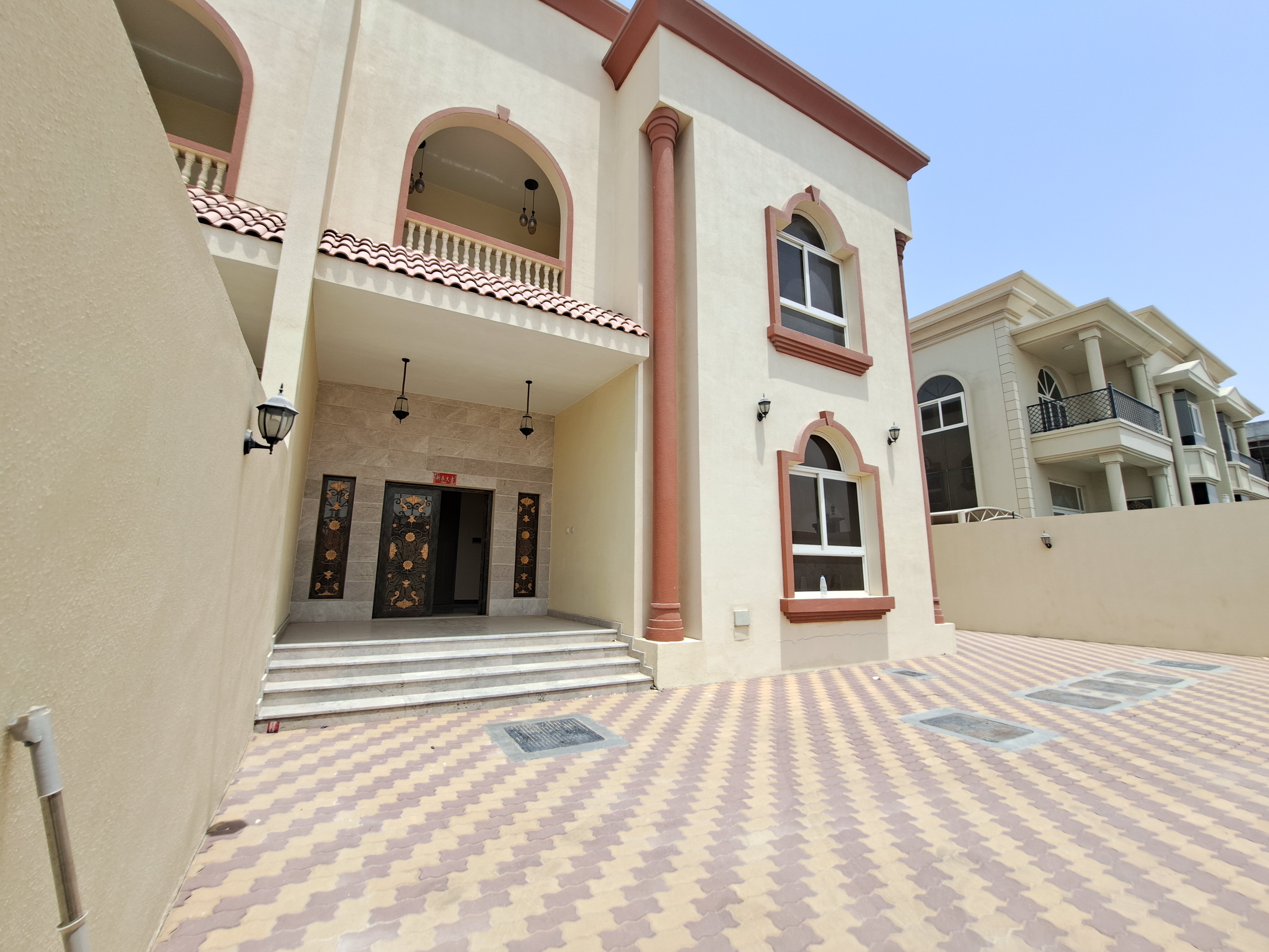 Like Brand new 4 bedroom villa with separate majlis With 1st floor hall in hoshi sharjah