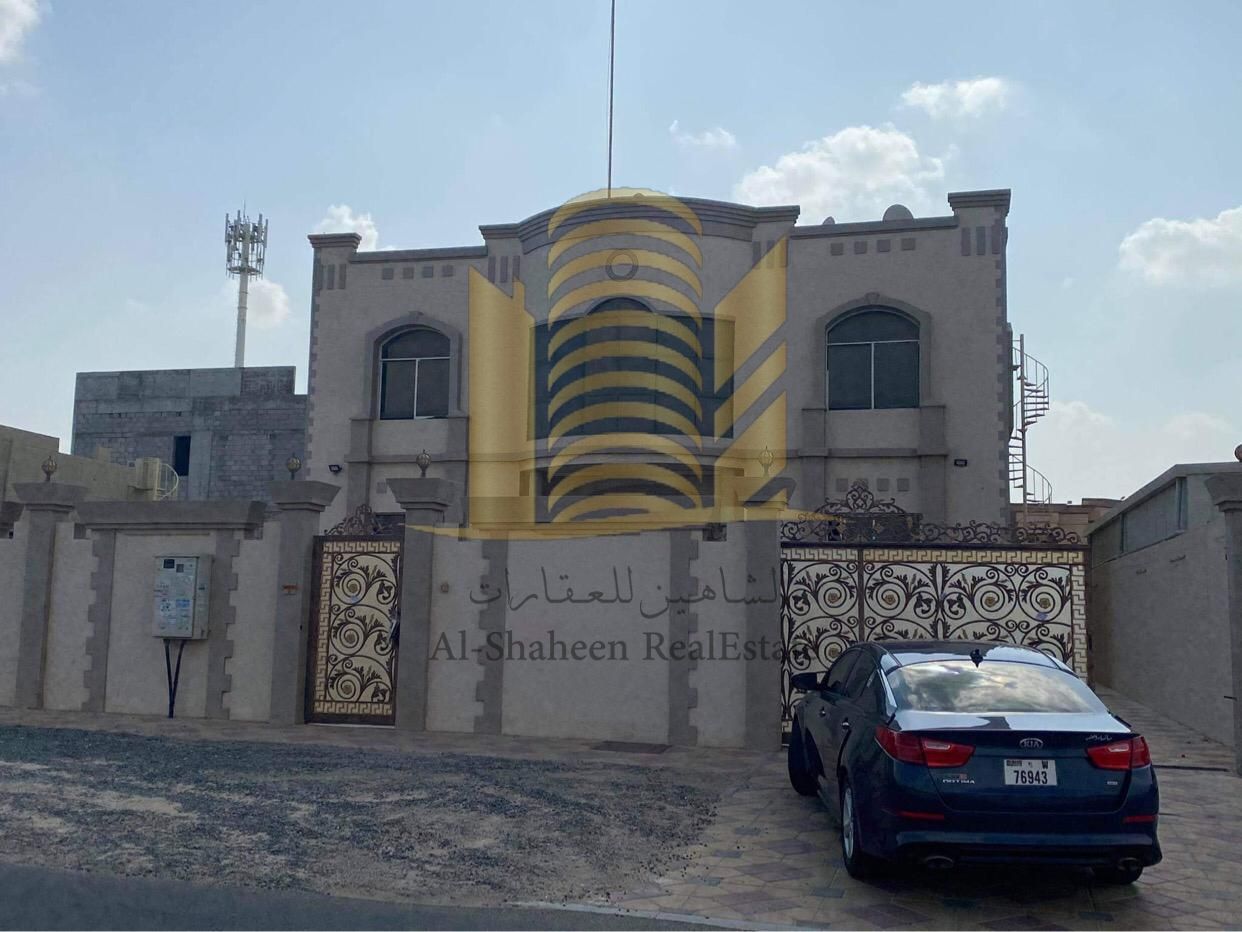Super deluxe two-story villa for rent in Ajman Al Raqaib - Near the mosque Ground floor: Men's majlis + dining room with bathroom and sinks