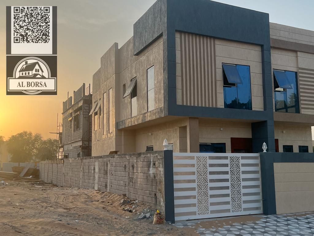 For rent a villa in Al Helio, Ajman, 5 master bedrooms, a living room and a hall, located in a strategic location near Mohammed bin Zayed Street