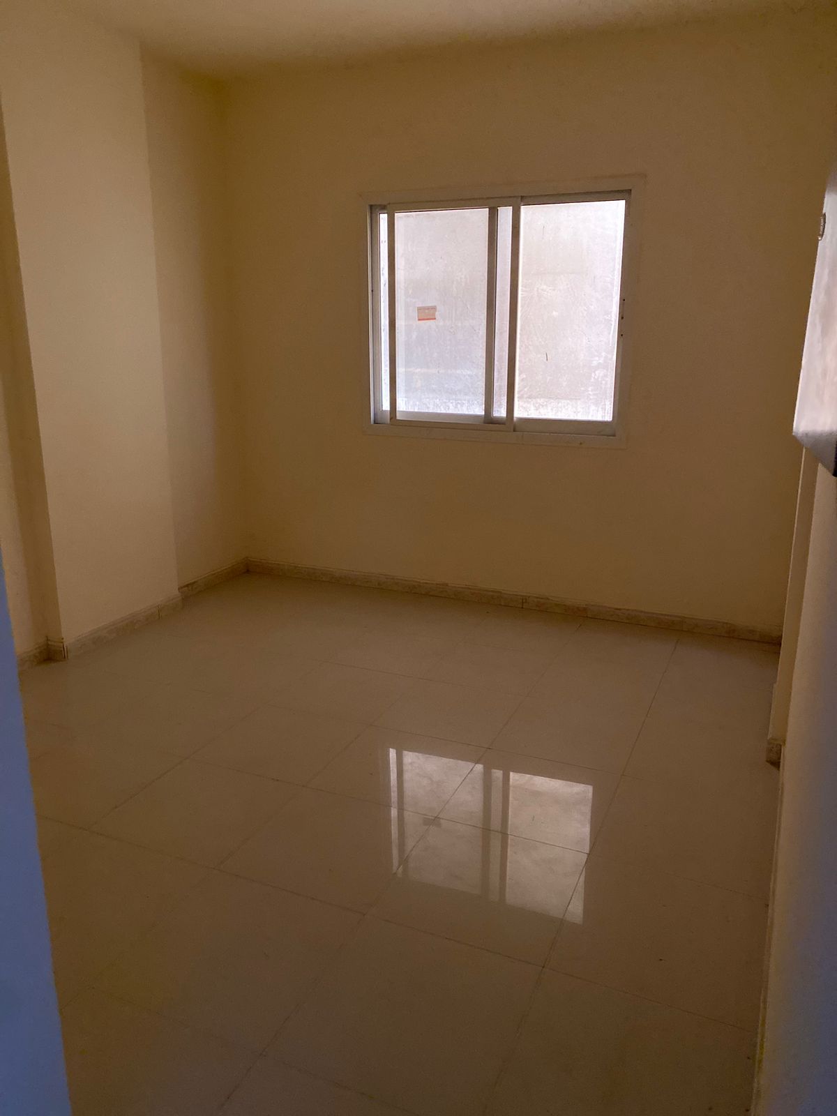 For annual rent in the United Arab Emirates Ajman A two-bedroom apartment, a living room, a kitchen, and two bathrooms available Al Nuaimiya 1, opp