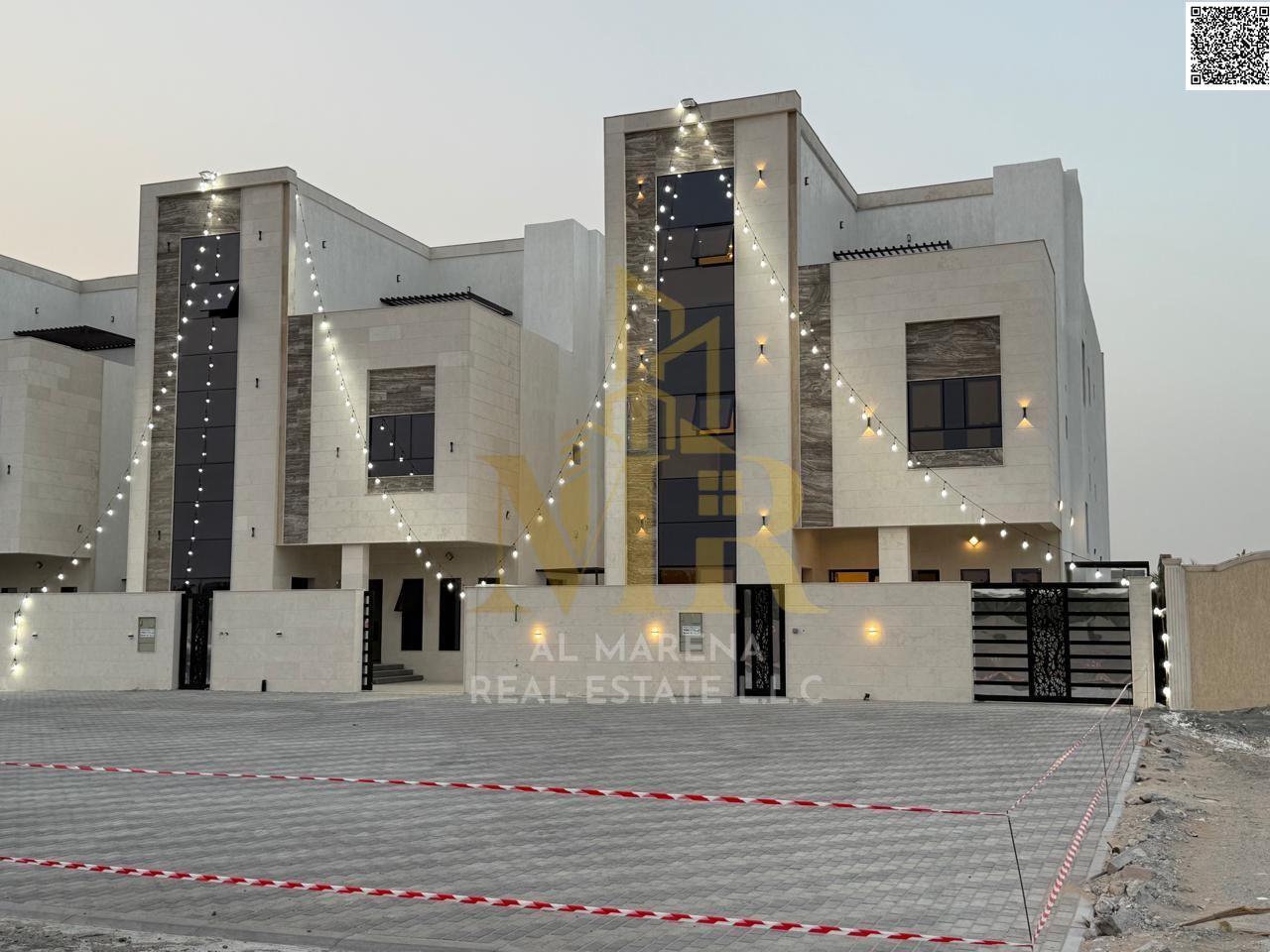 Two-story villa and roof in Ajman, 6 master bedrooms, hotel finishing, price includes registration and ownership fees, freehold