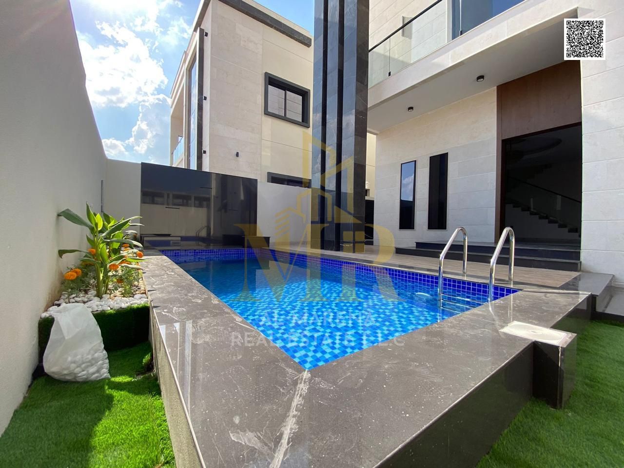 For sale - a luxury villa with a swimming pool in a prime location in Ajman, high-end finishing, modern design, including registration and owners