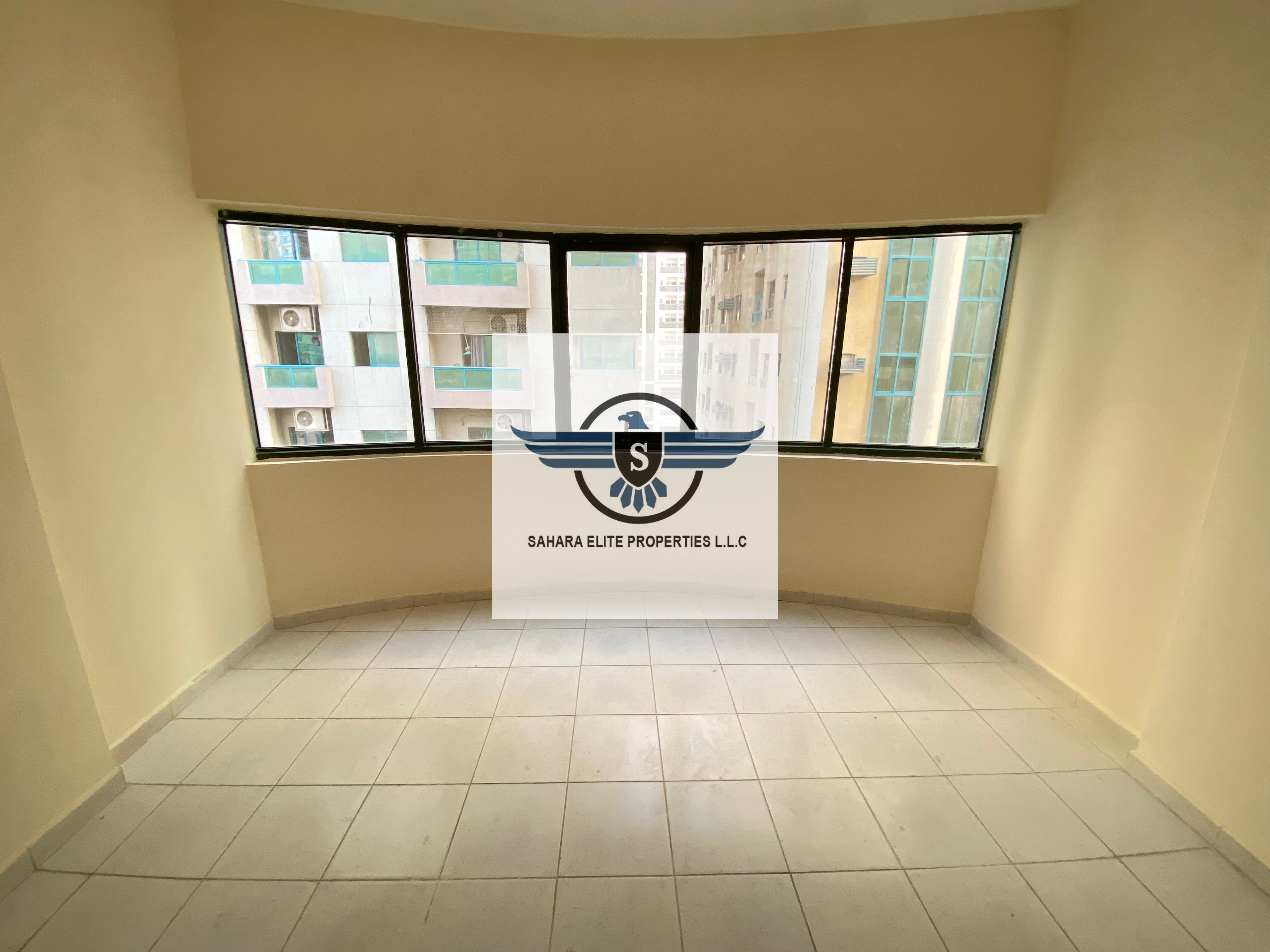 Spacious 2bhk with balcony GYm & play kids area separate hall very close to Dubai border available in Al Nahda Sharjah