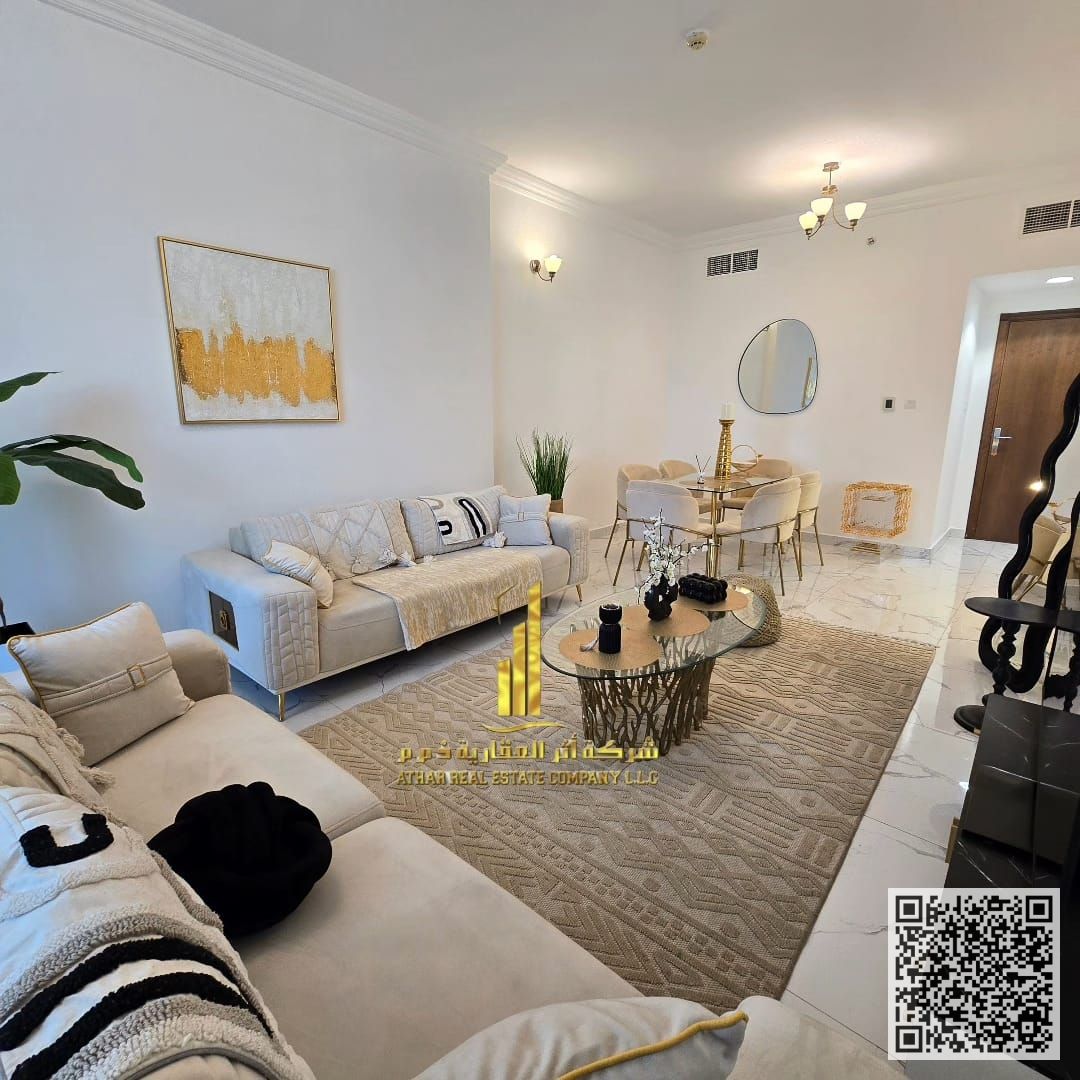 Luxurious two-bedroom apartment with a gym and a swimming pool, newly furnished for monthly rent in Ajman - Al Rashidiya 1 - Oasis Towers