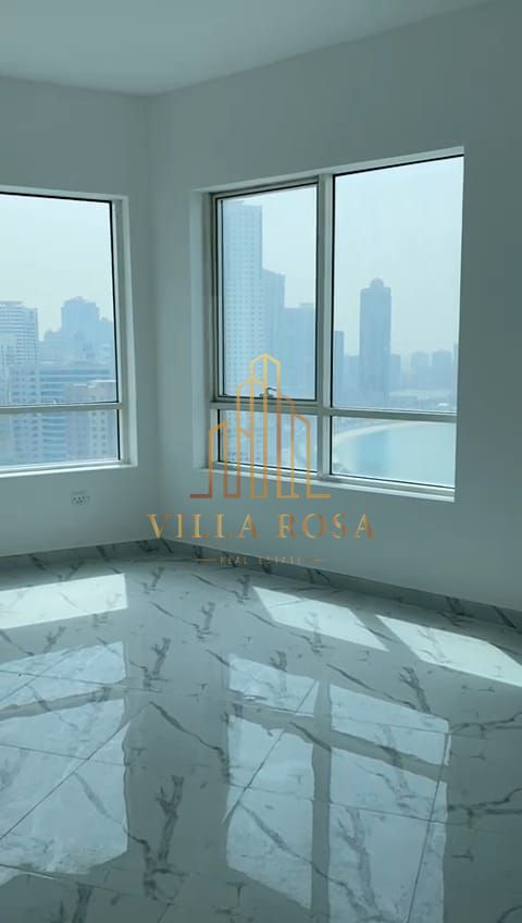 Two-bedroom apartment with a living room for sale in Al Shati Tower 1, with a good view of the sea.