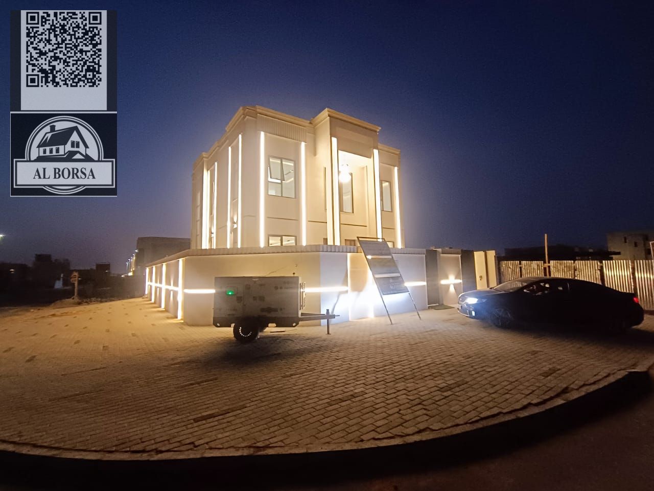 Corner villa for sale in Al Helio 2, Ajman, 4 bedrooms, a majlis, a hall, a kitchen, a spacious area, including registration fees and air conditioning