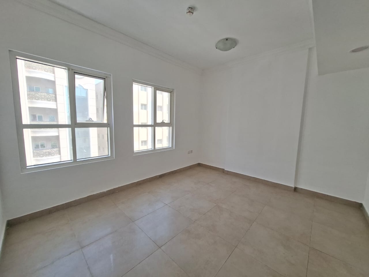 Like brand new building Muwaileh Commercial sharja 2bhk with balcony parking 2 washroom