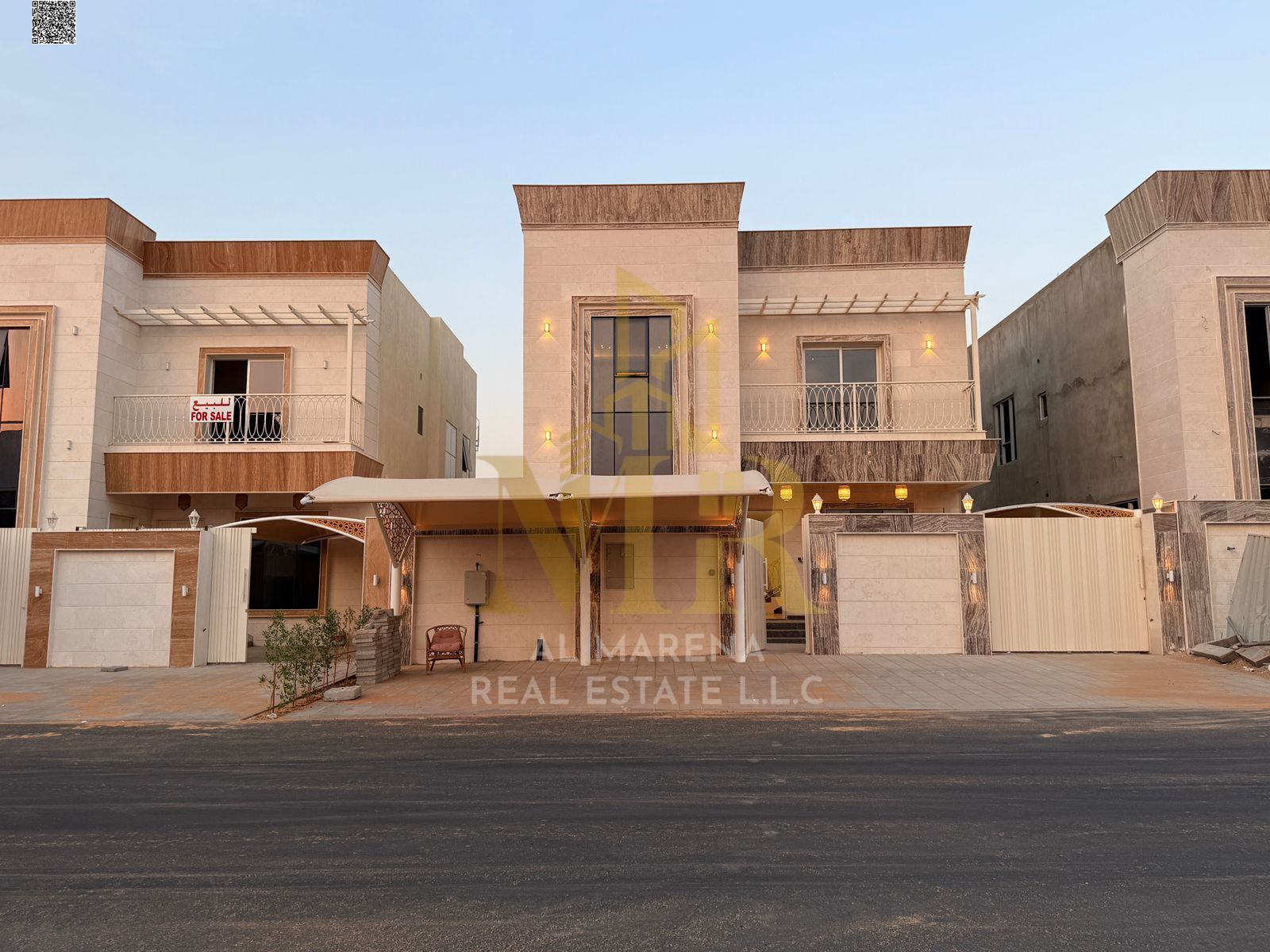 A villa in Al Helio, with a price including registration fees, ownership, electricity, water, and air conditioners, on the main street, ready for occu