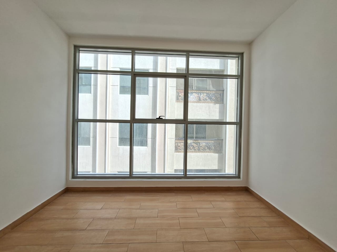 Like brand new building in Muwaileh Sharjah 2bhk with waldrop parking prim location sharja in school area 1month free