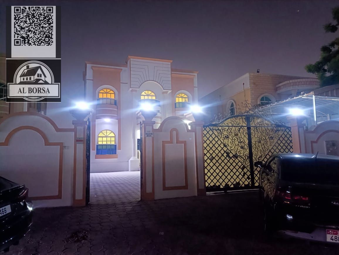For sale, a villa in Al Rawda 3, Ajman, 5 rooms, a living room, a maid's room, and a spacious yard.