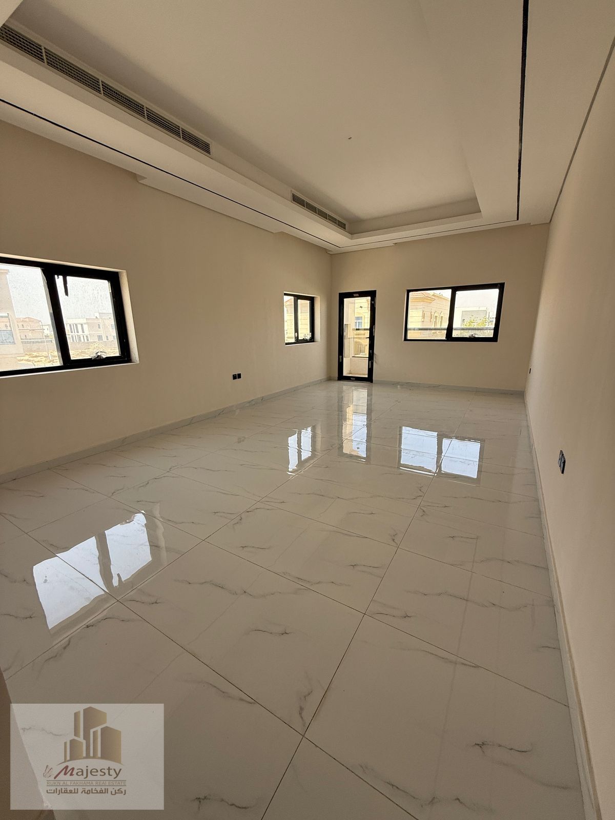 For sale, a villa in the Emirate of Sharjah, Al-Hoshi area, featuring a modern design, high-end finishes, and large spaces. The villa has an elevator