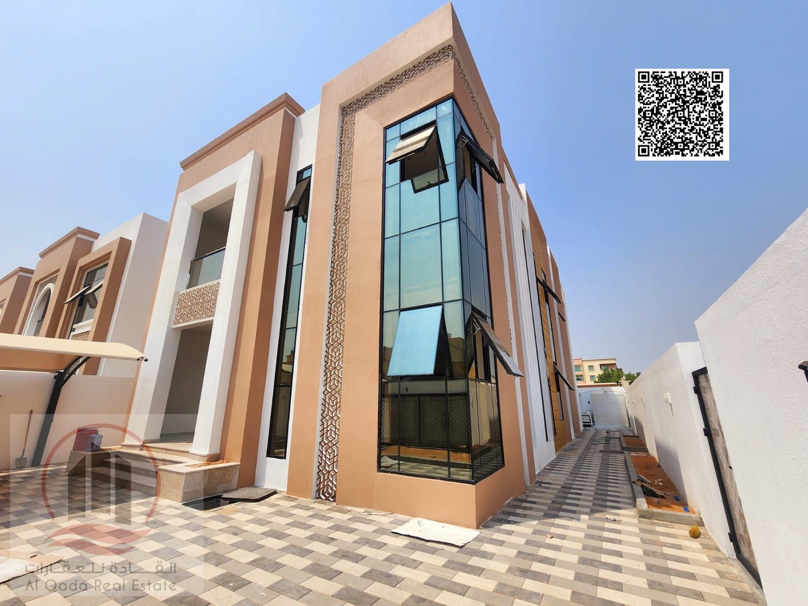 Villa for sale in Al Muwaihat 3, Ajman. Modern design. The villa includes 5 master bedrooms, a living room with a bathroom, 2 main halls, and a maid's