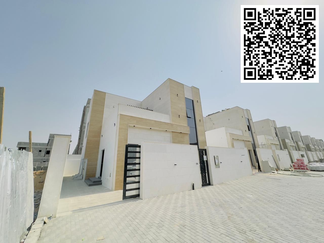 A luxury villa in Ajman, Al Helio 1 area, consisting of 4 master bedrooms, a living room, a hall, and a maid's room in a very luxury neighborhood, a ا