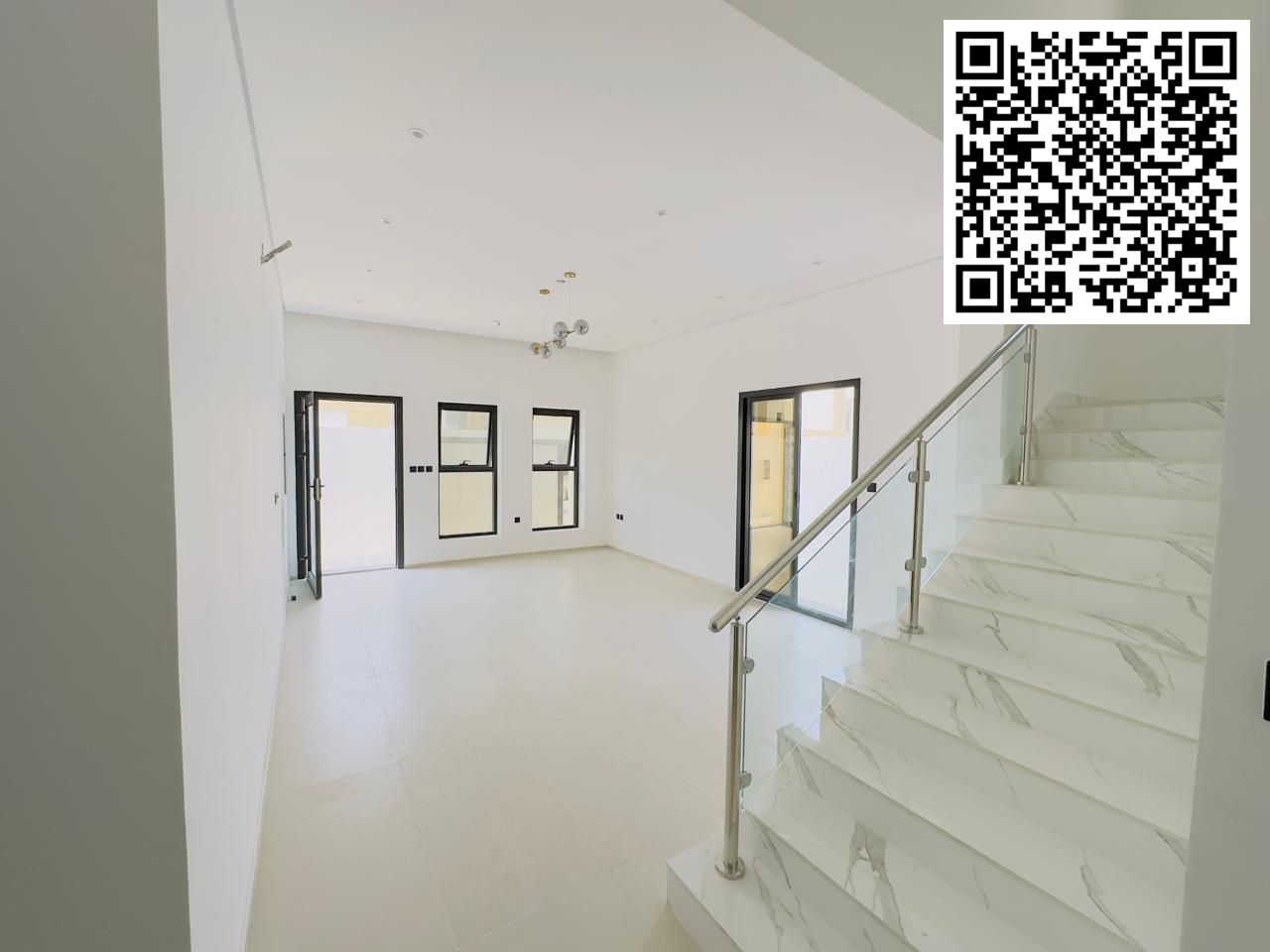 Luxury villa for sale in Ajman, Al Zahia area, consisting of 4 master bedrooms, a living room, a hall, and a courtyard