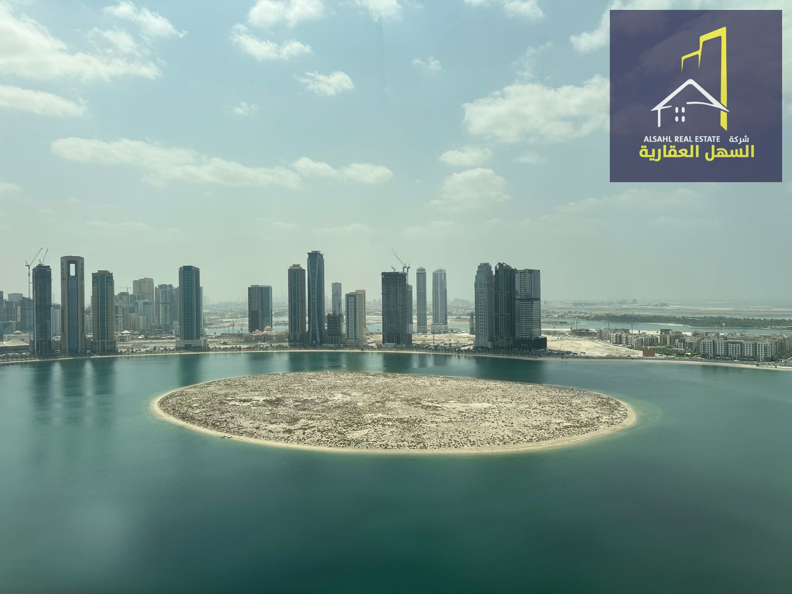 For sale, an apartment in Al Anwar Tower, Al Khan area, with a full view of the lake