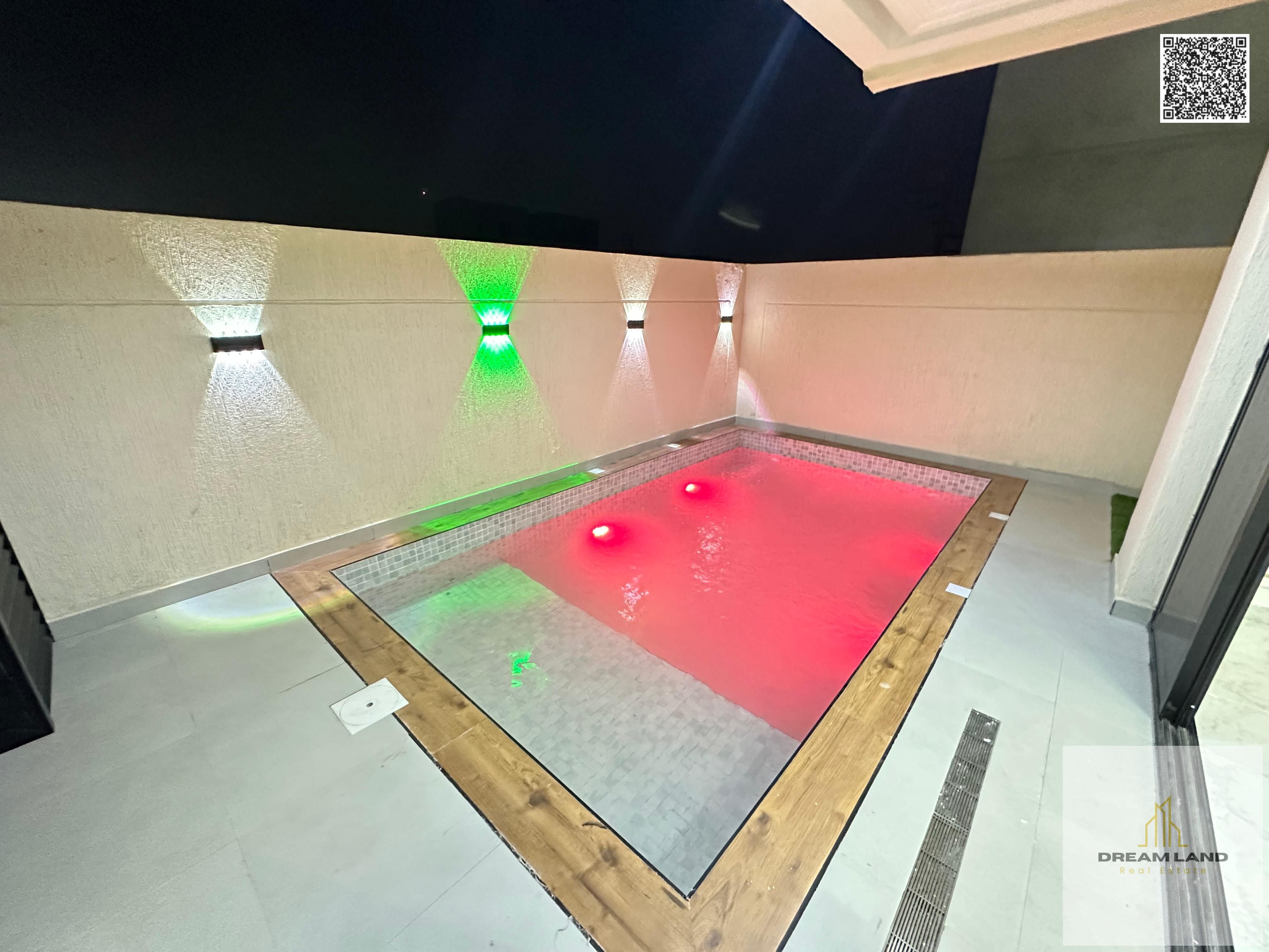 Luxury super deluxe villa for sale in Al Helio 2 area in Ajman with a swimming pool for 1,750,000 including registration and ownership, freehold