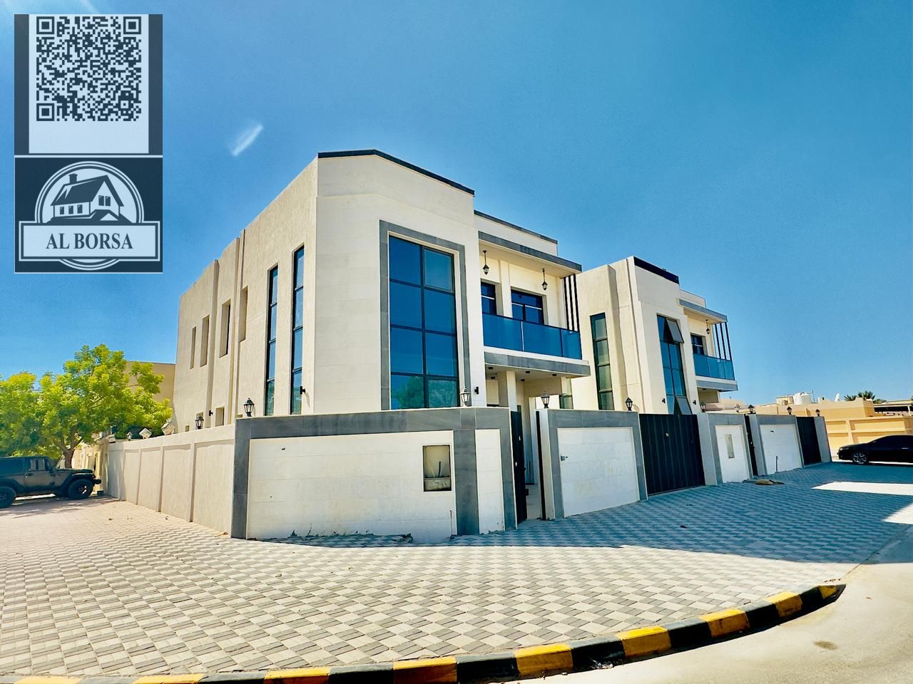 For sale in Ajman, a luxurious corner villa in Al Muwaihat 2 on Sheikh Ammar Street, negotiable, including electricity, water and drainage, two floors