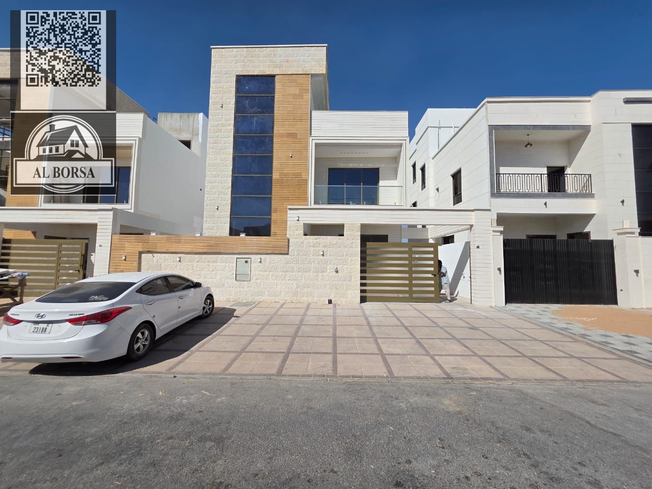 Villa for sale in Ajman, Al Bahia area Land area: 3,014 sq ft Built-in area: 4,922 sq ft Six master bedrooms Three living rooms Majlis Kitchen Service
