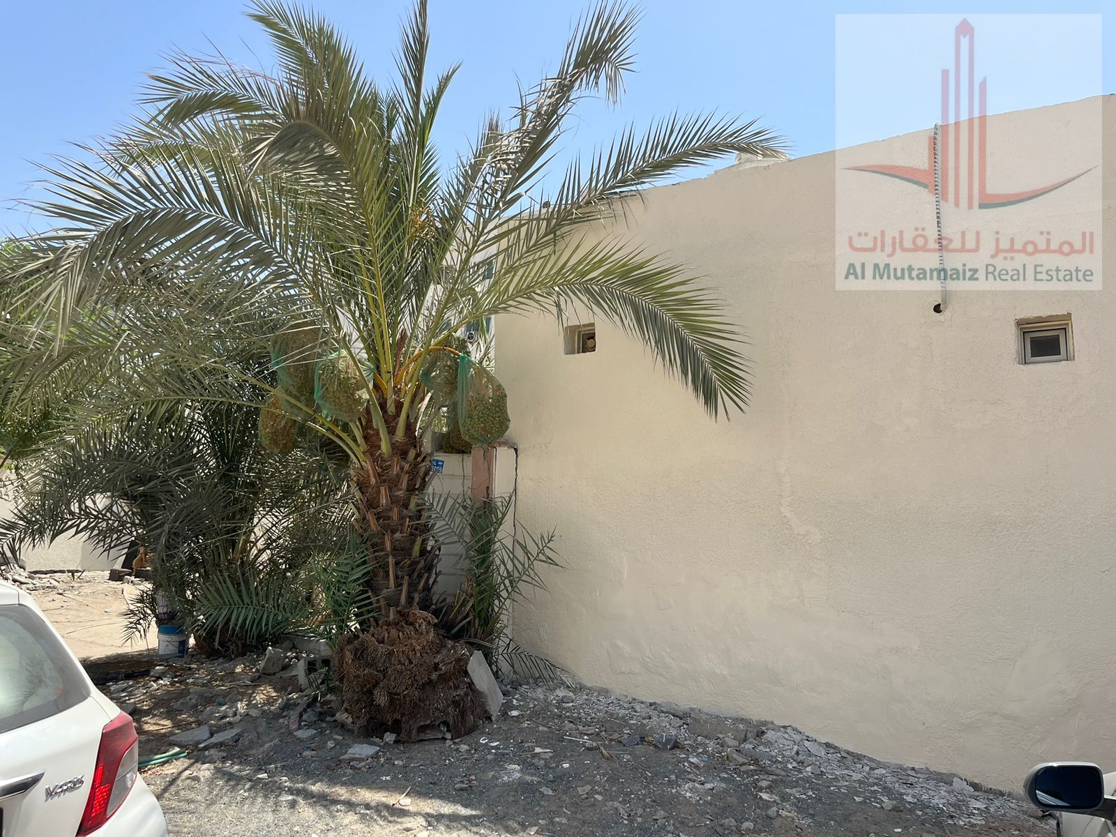For rent, an Arabic house in Al Bustan area, consisting of 5 master bedrooms + 2 large halls + a very large storage area