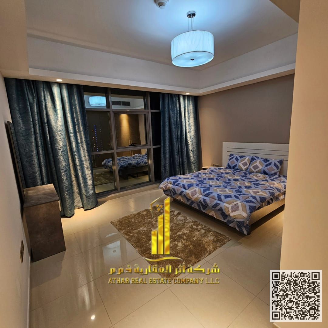 Furnished apartment for rent in Al Rashidiya - Gulfa Tower, 2 bedrooms, hall + gym, swimming pool, and parking - luxury finishing