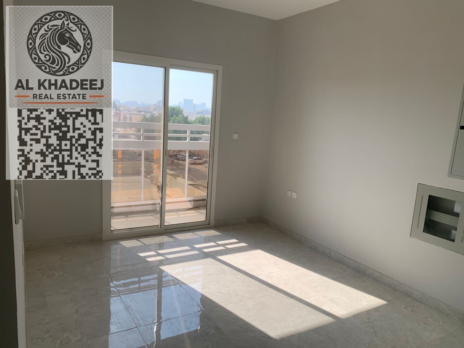 First tenant, two rooms and a hall, with a large area, in the Rawda 1 area, opposite Kanz Mall, close to the exit of Dubai and Sharjah