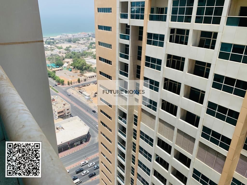Empty Open Kitchen 2 BHK with Parking for SALE in Ajman One Towers