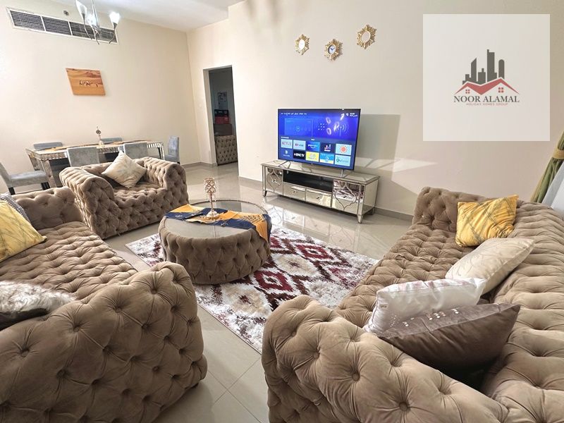 Sharjah Al Taawun, two-bedroom apartment, hall, kitchen, two bathrooms and balcony