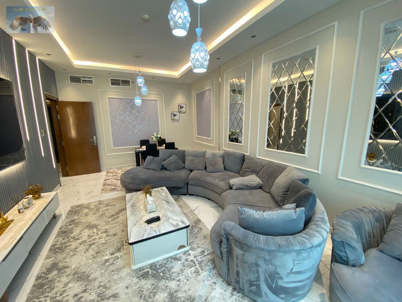 For sale in Ajman, in the Oasis Tower in the Rashidiya 1 area. 3 fully furnished bedrooms and a living room with 4 bathrooms are available,
