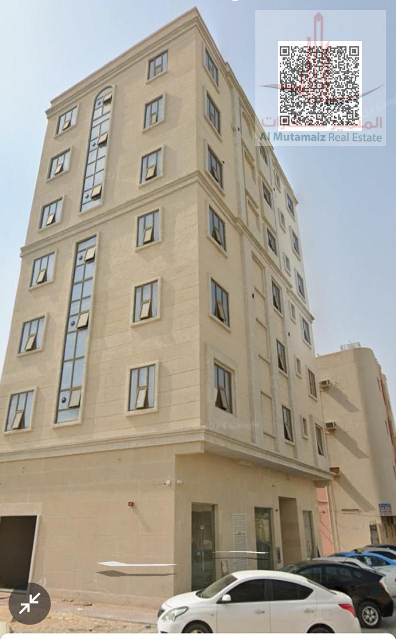 Entire building for sale in Al Nakheel area, very distinguished location, attractive income and very competitive price