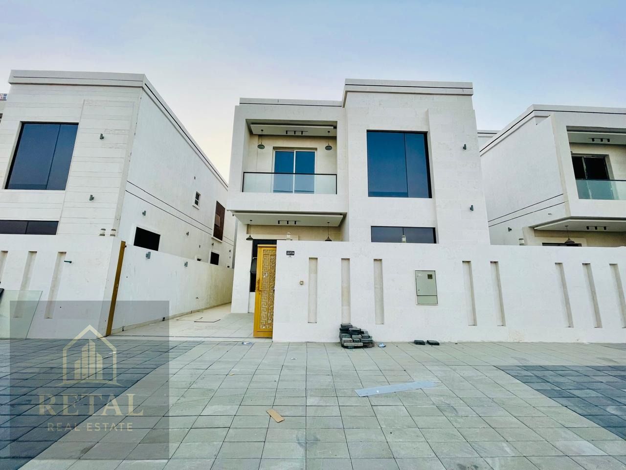 Luxury villa for sale in Al Helio Ajman on main road 5BR with living room majlis maid room and equipped kitchen AED 18M negotiable