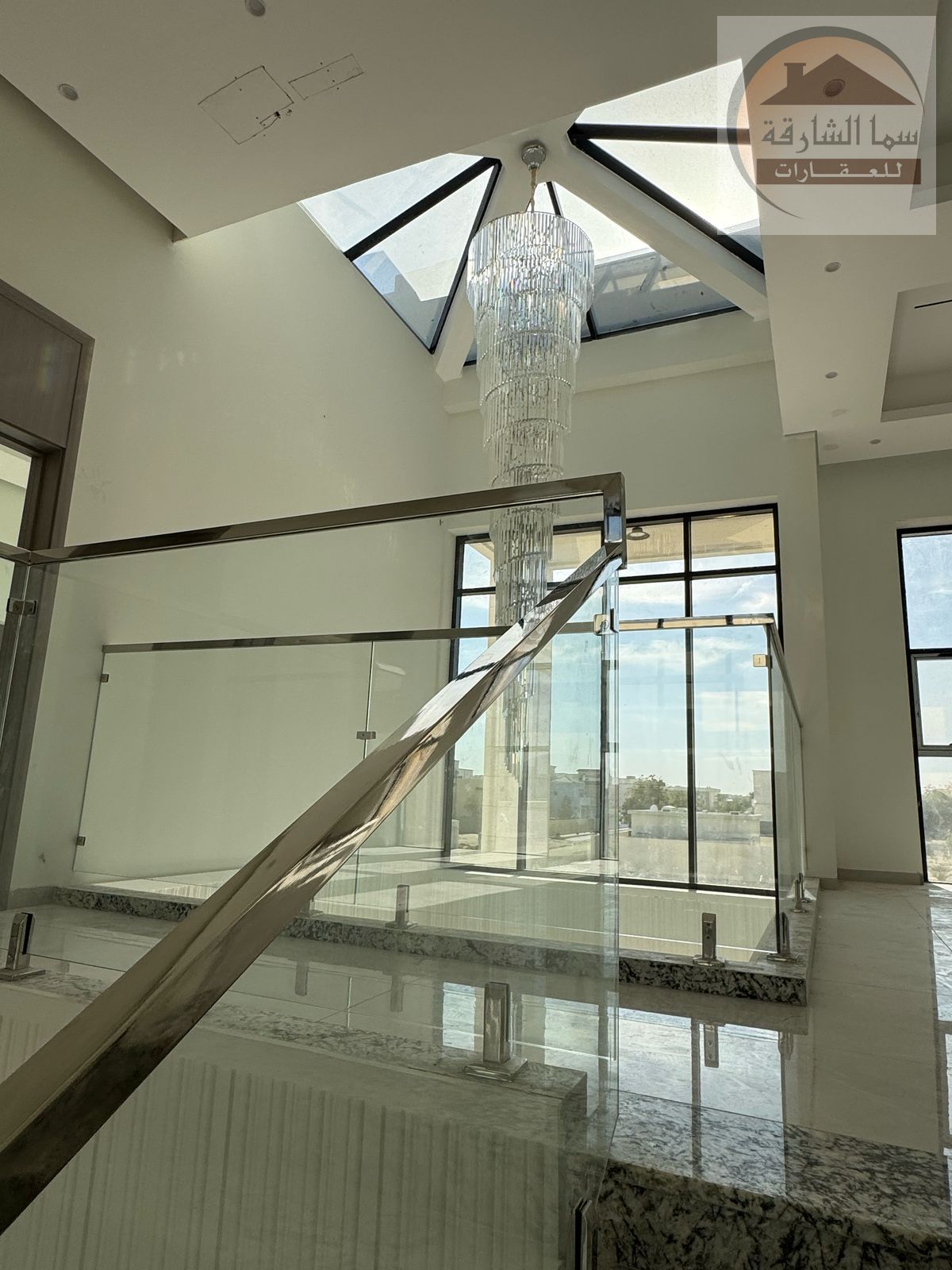 For sale, a new two-story villa, first inhabitant, central air conditioning, very high-end finishing, Al Ramaqiya area, Wasit suburb, Sharjah, a very