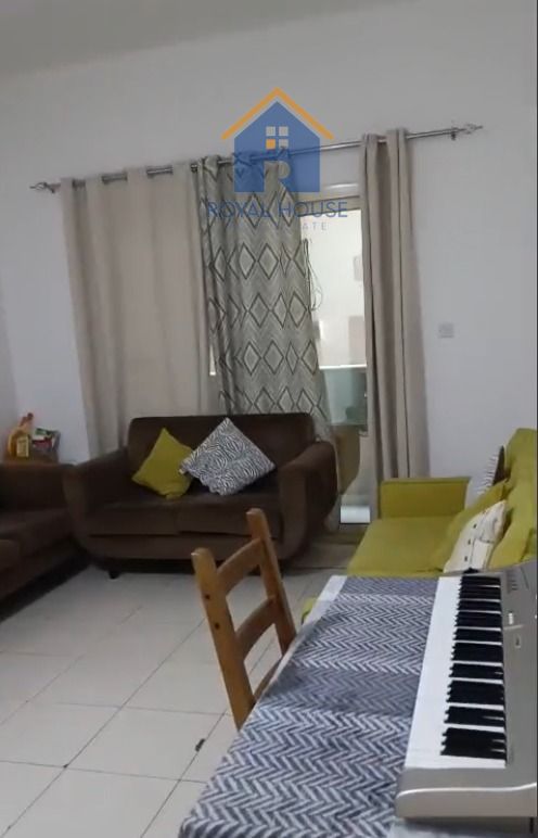For sale, a room and a hall with a parking space in Al Taawun